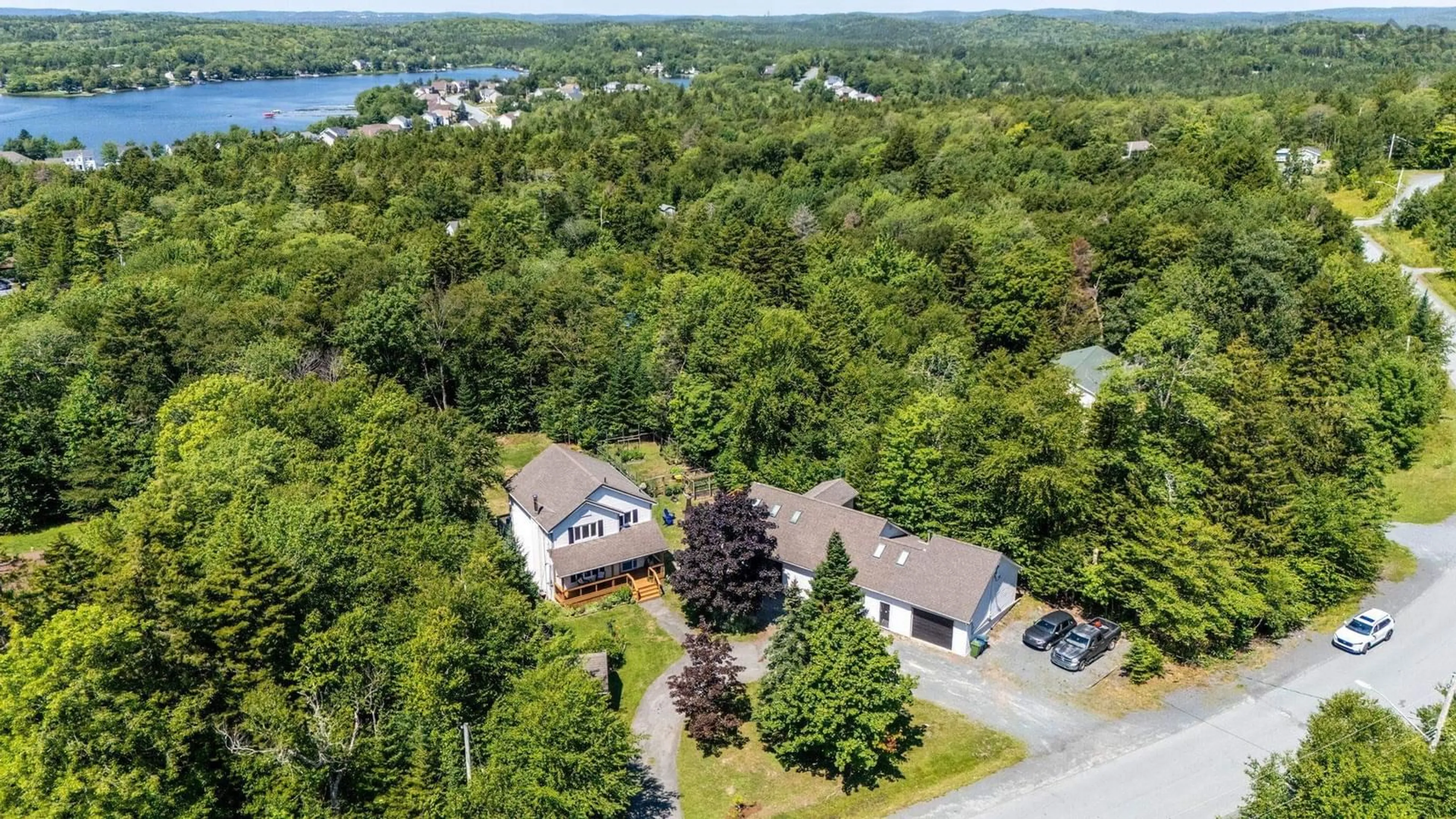 A pic from outside/outdoor area/front of a property/back of a property/a pic from drone, water/lake/river/ocean view for 60 Lylewood Dr, Middle Sackville Nova Scotia B4E 3B1