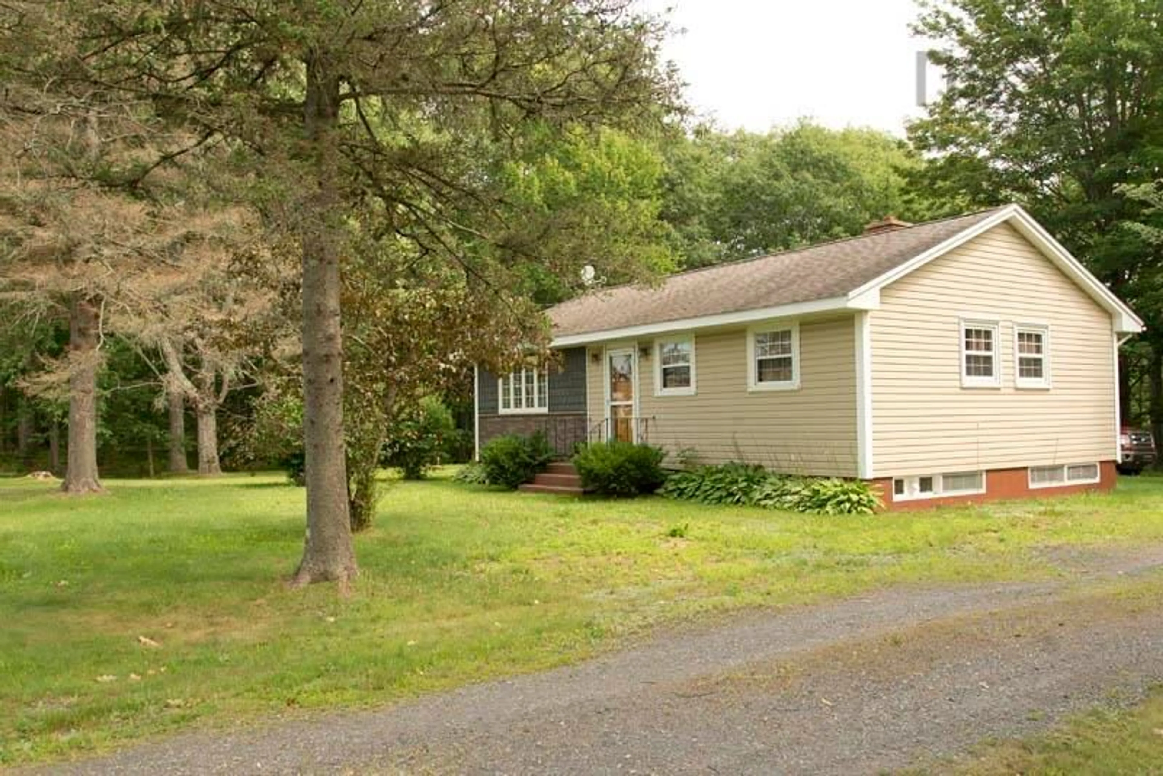 Home with vinyl exterior material, street for 3310 Highway 1, Aylesford Nova Scotia B0P 1C0