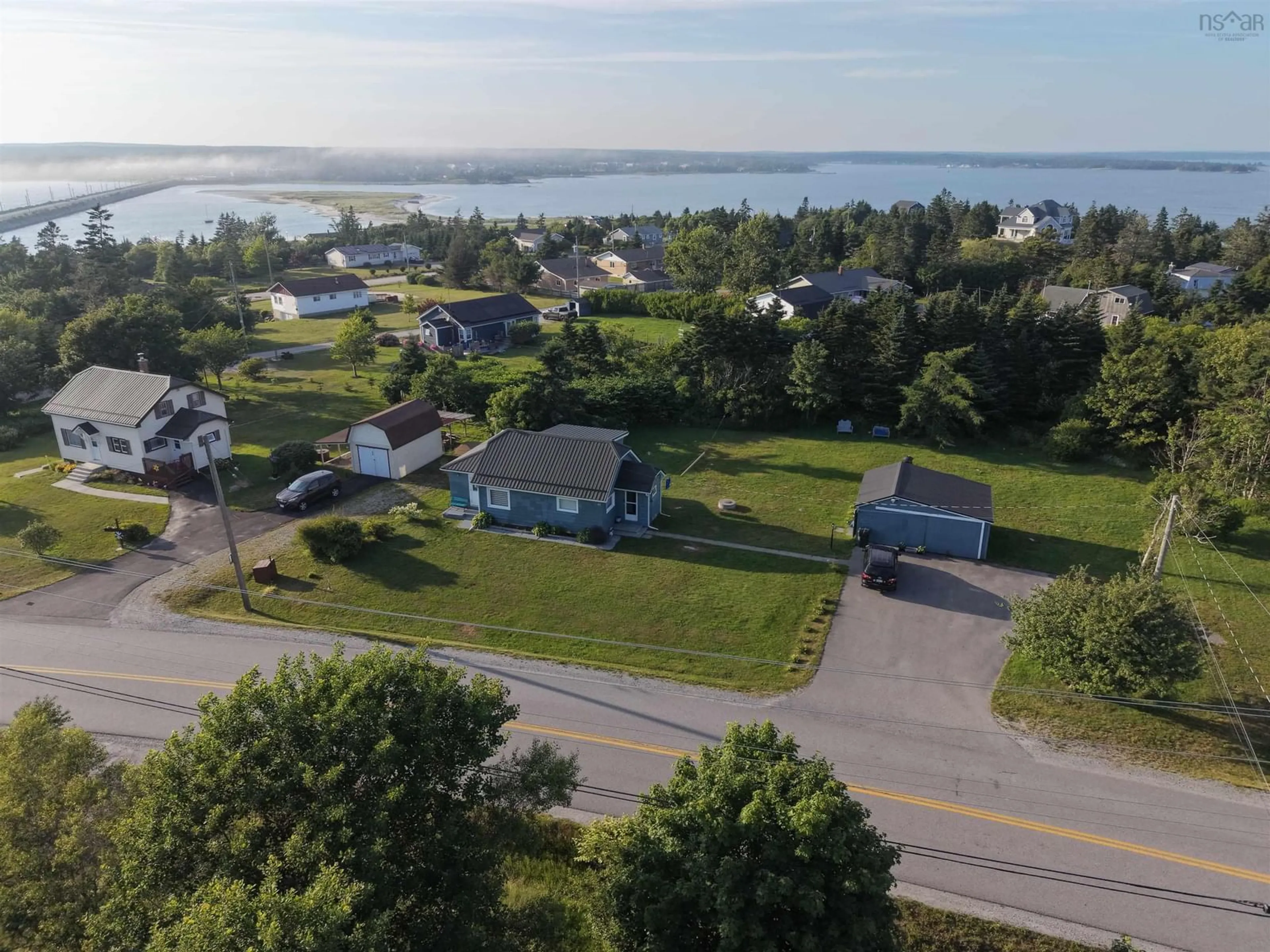 A pic from outside/outdoor area/front of a property/back of a property/a pic from drone, water/lake/river/ocean view for 41 Stoney Island Rd, North East Point Nova Scotia B0W 2P0