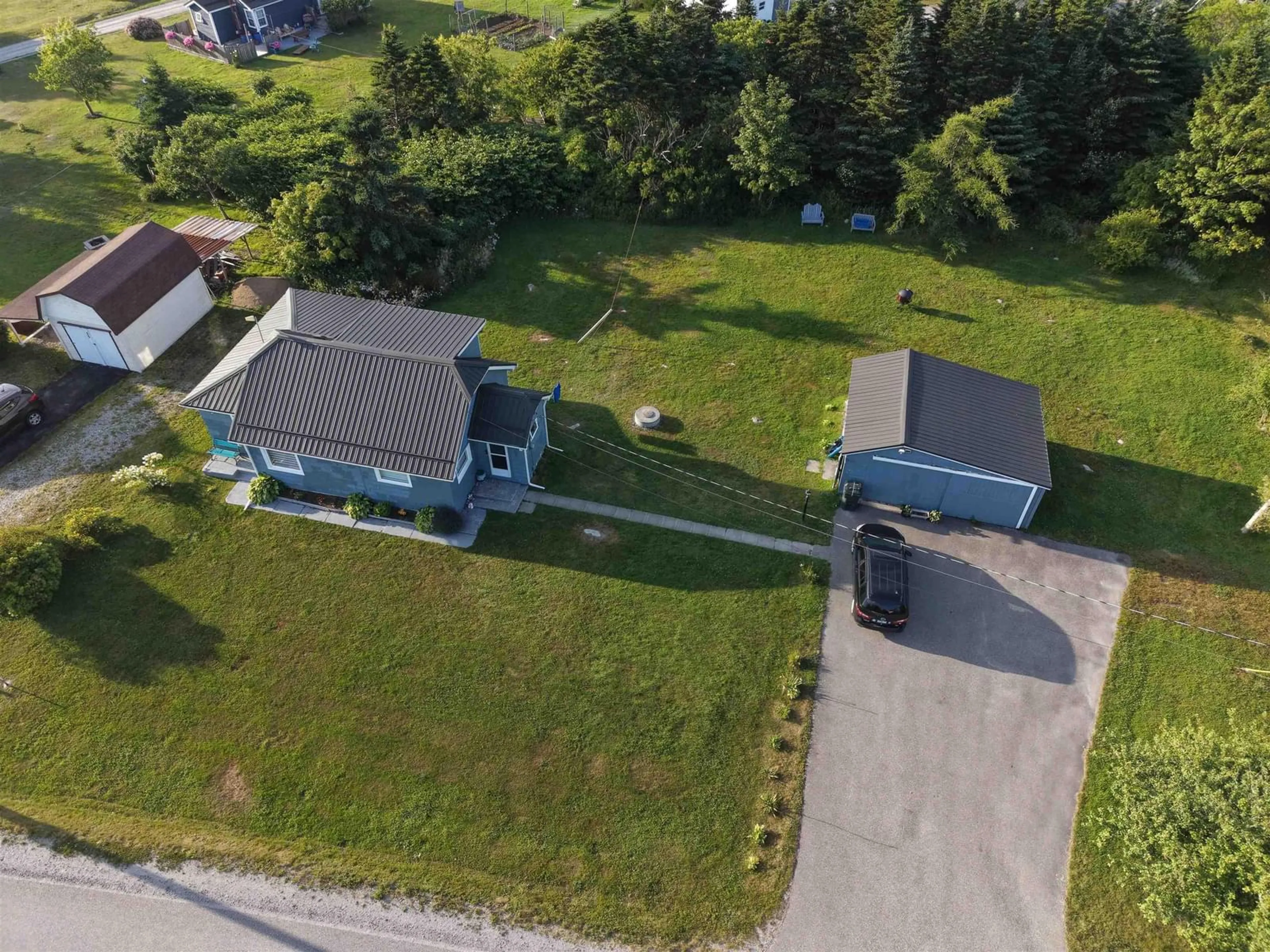 A pic from outside/outdoor area/front of a property/back of a property/a pic from drone, street for 41 Stoney Island Rd, North East Point Nova Scotia B0W 2P0
