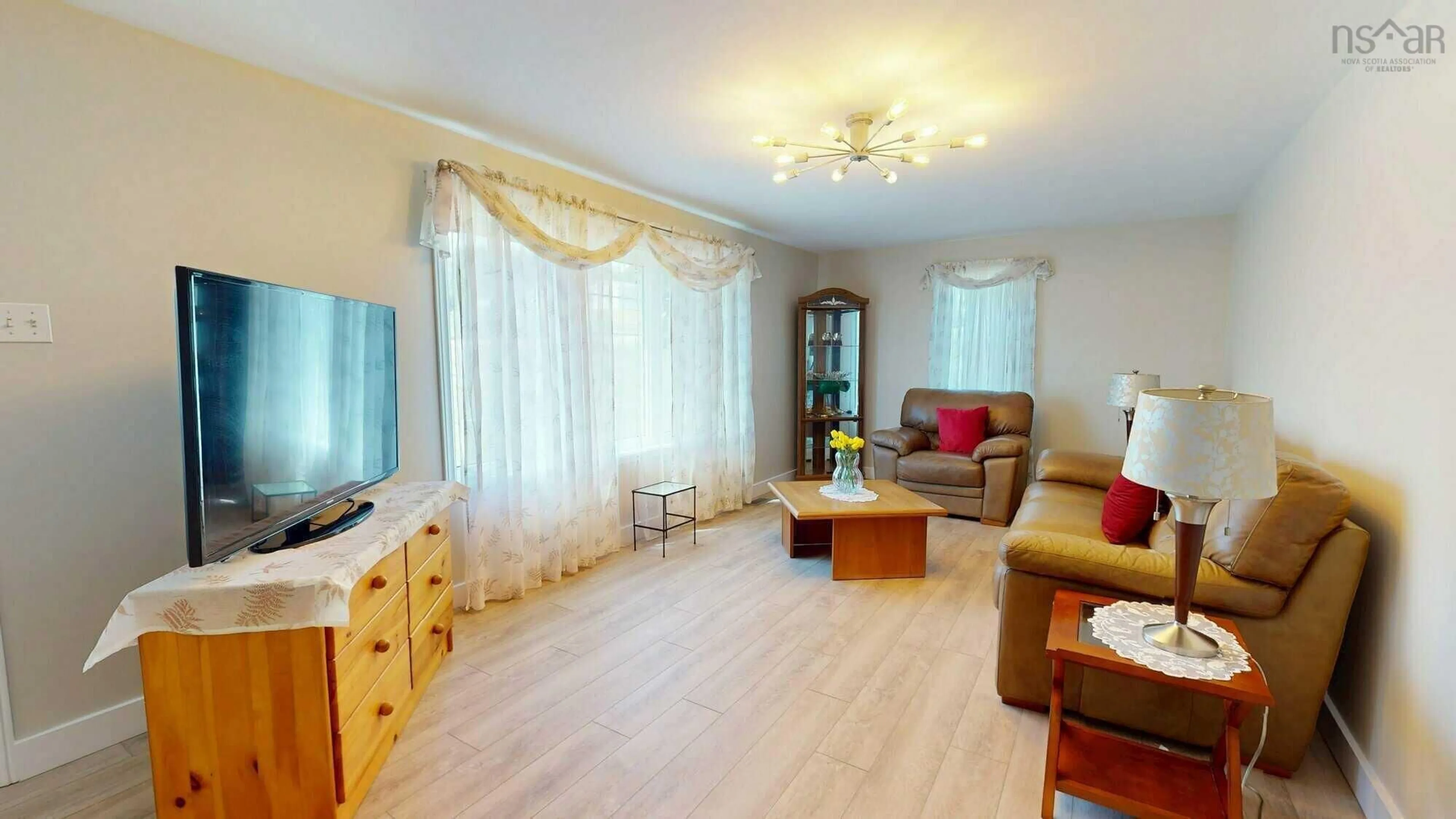 Living room with furniture, wood/laminate floor for 12473 Ns-4, Havre Boucher Nova Scotia B0H 1P0