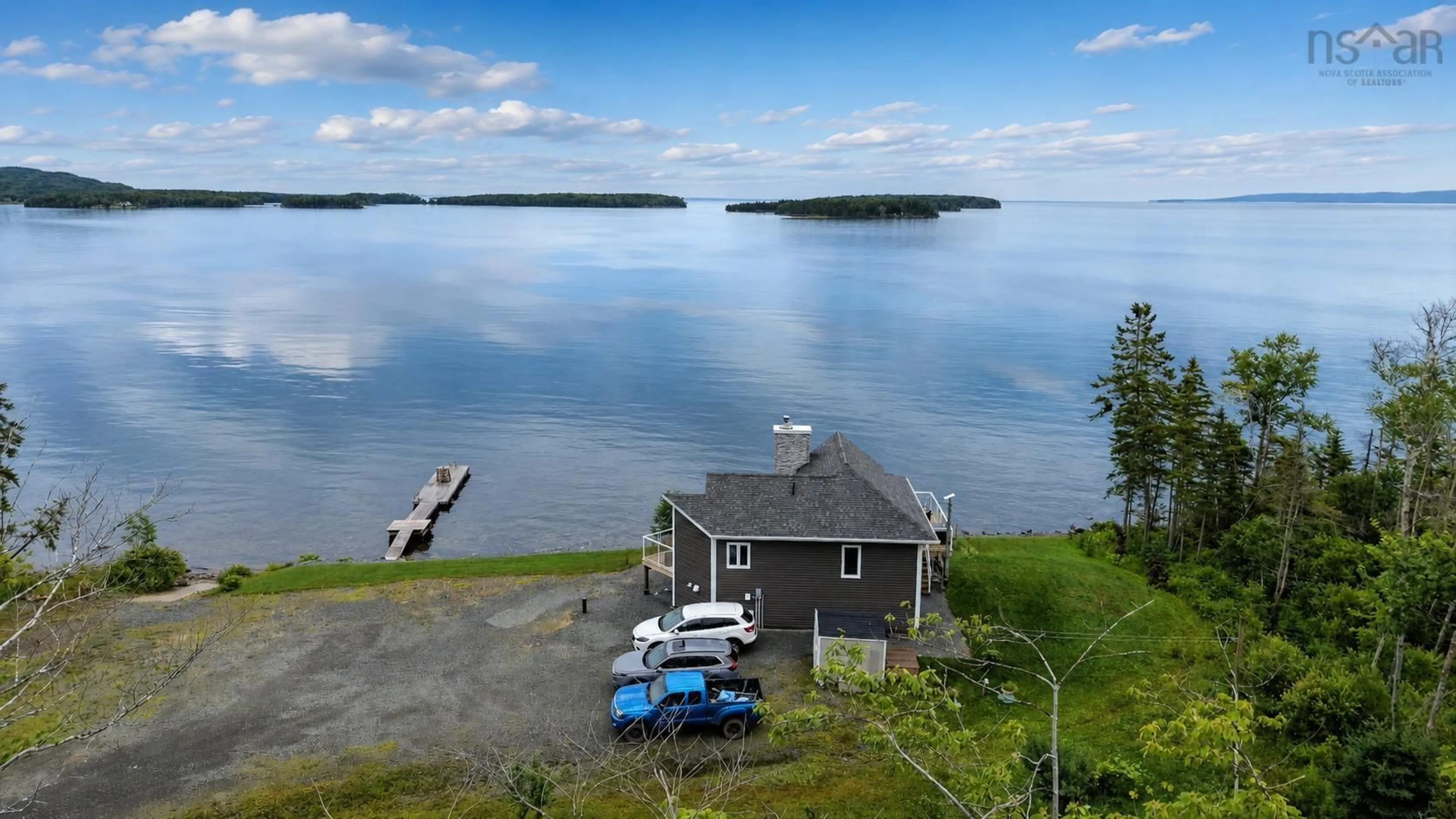A pic from outside/outdoor area/front of a property/back of a property/a pic from drone, water/lake/river/ocean view for 5628 Marble Mountain Road Rd, Marble Mountain Nova Scotia B0E 3K0
