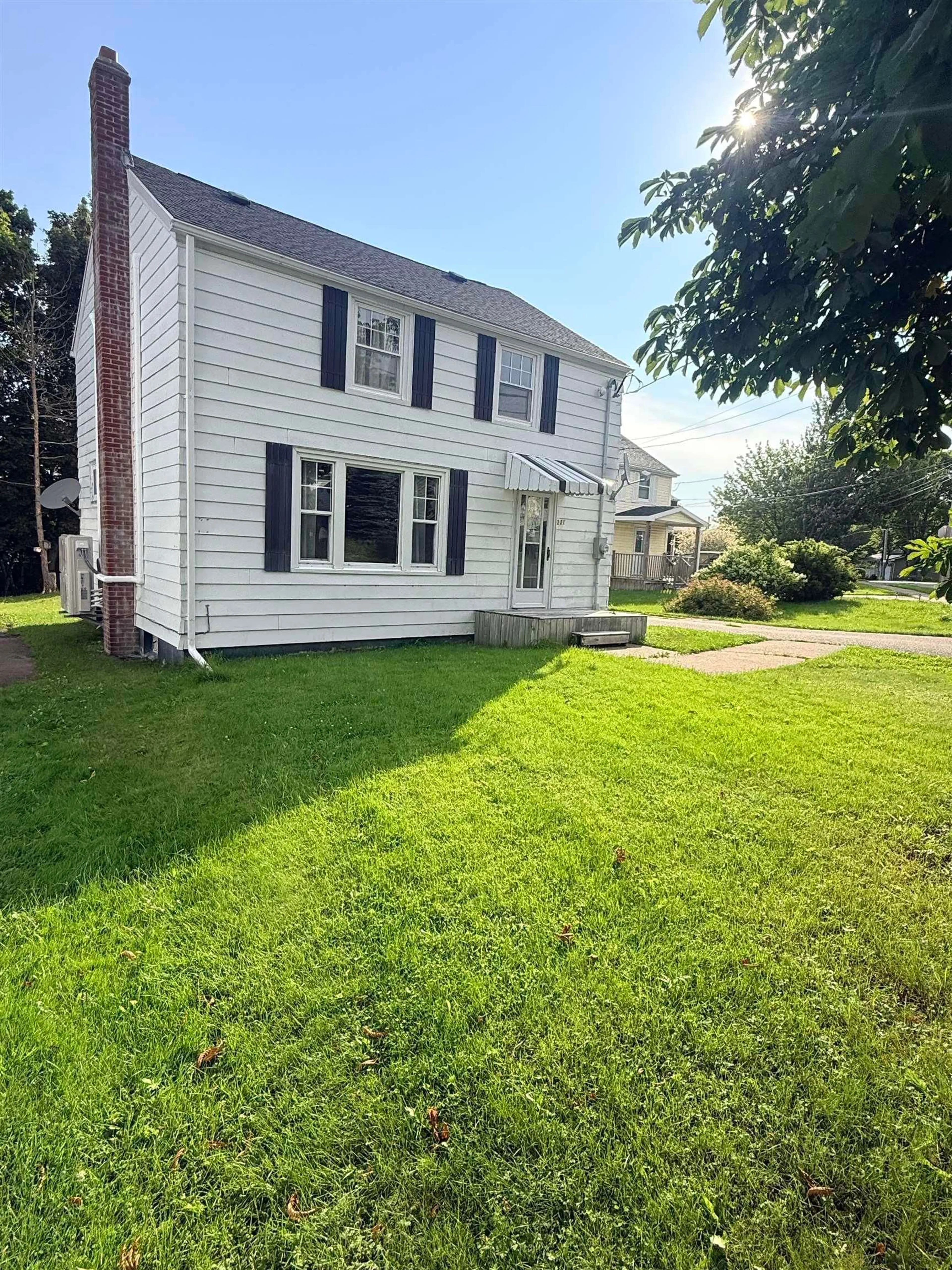 A pic from outside/outdoor area/front of a property/back of a property/a pic from drone, street for 221 Cottage Rd, Sydney Nova Scotia B1P 2E7