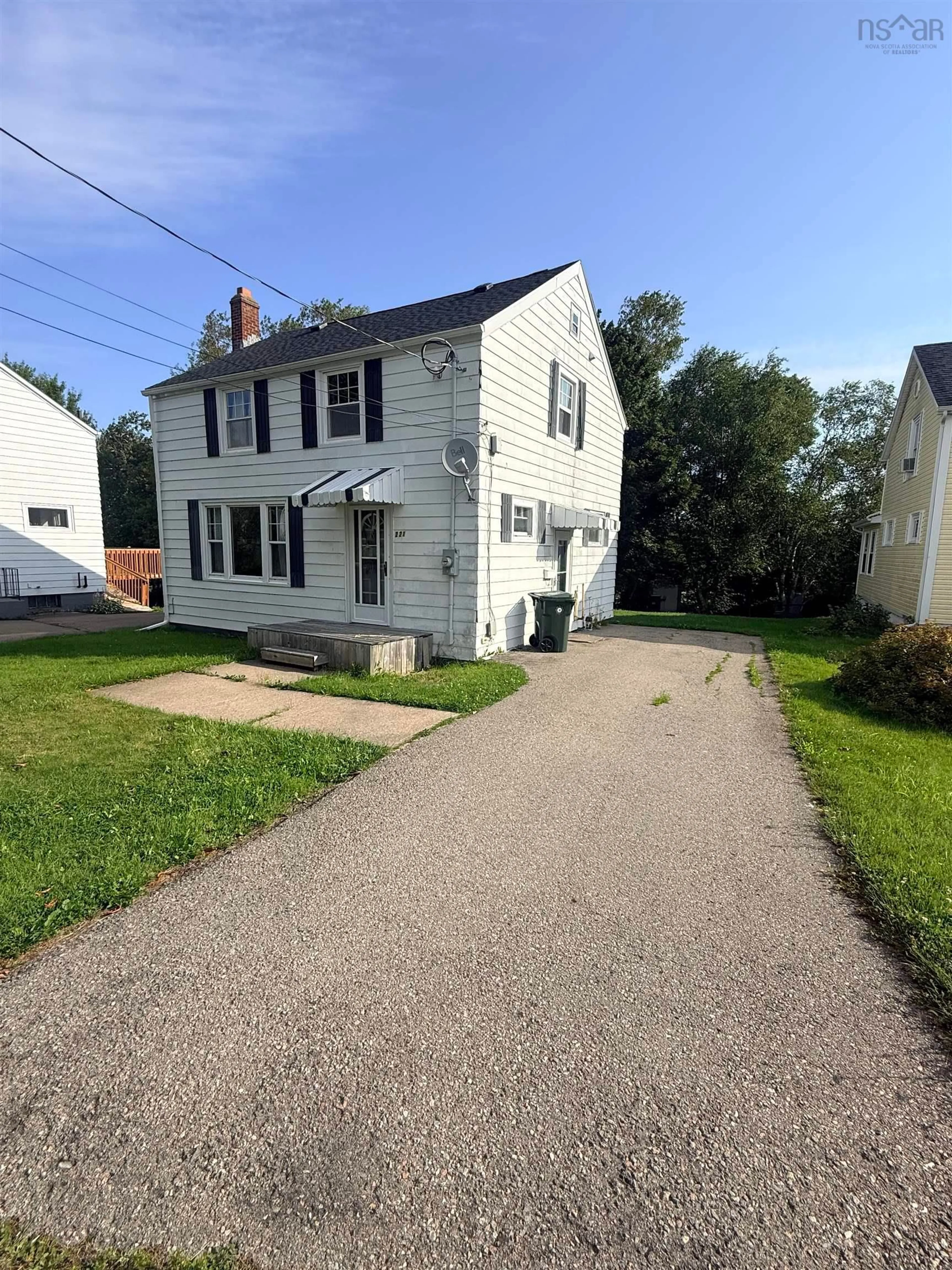 A pic from outside/outdoor area/front of a property/back of a property/a pic from drone, street for 221 Cottage Rd, Sydney Nova Scotia B1P 2E7