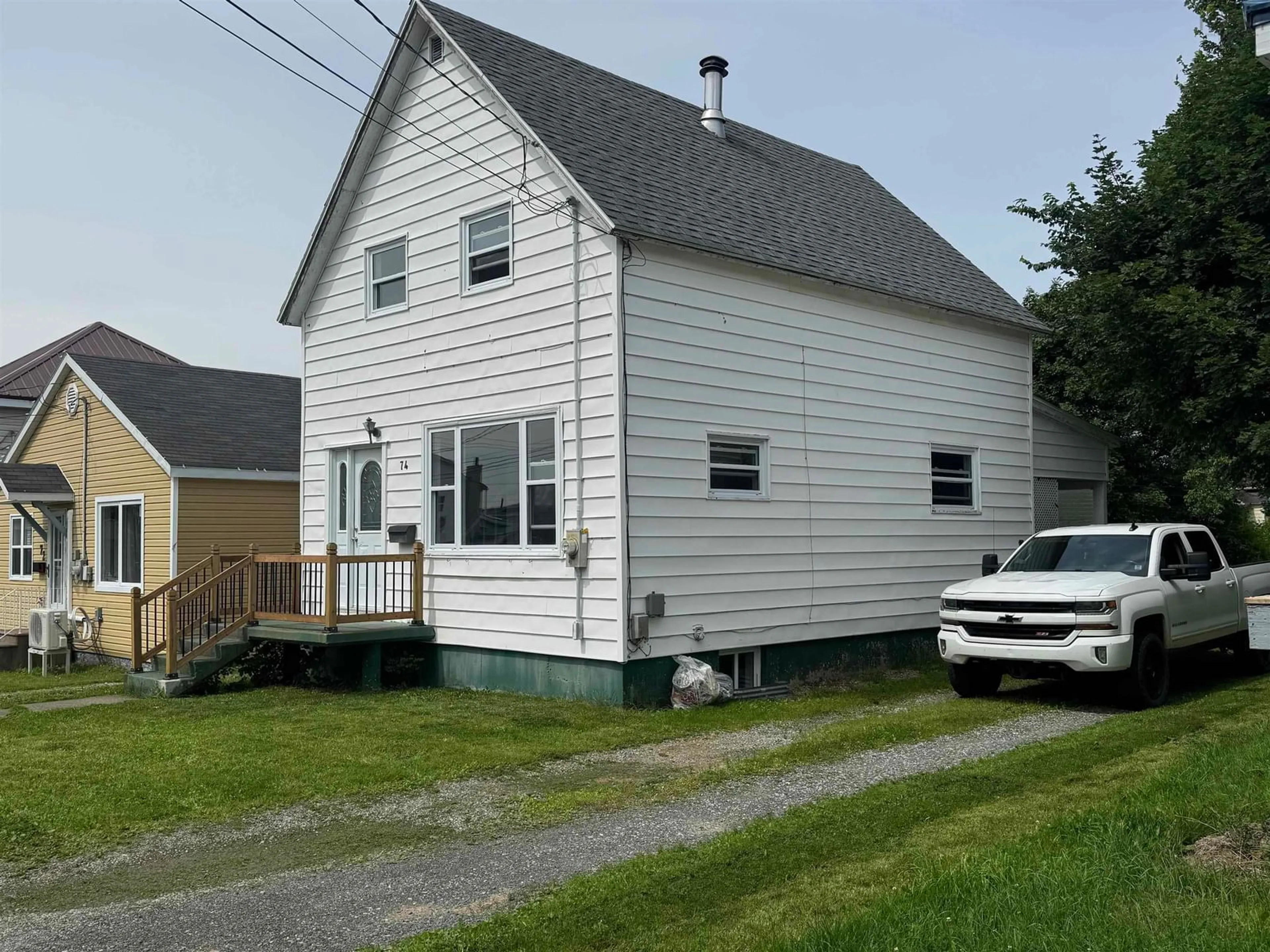 Home with vinyl exterior material, street for 74 Stanley St, North Sydney Nova Scotia B2A 1V2