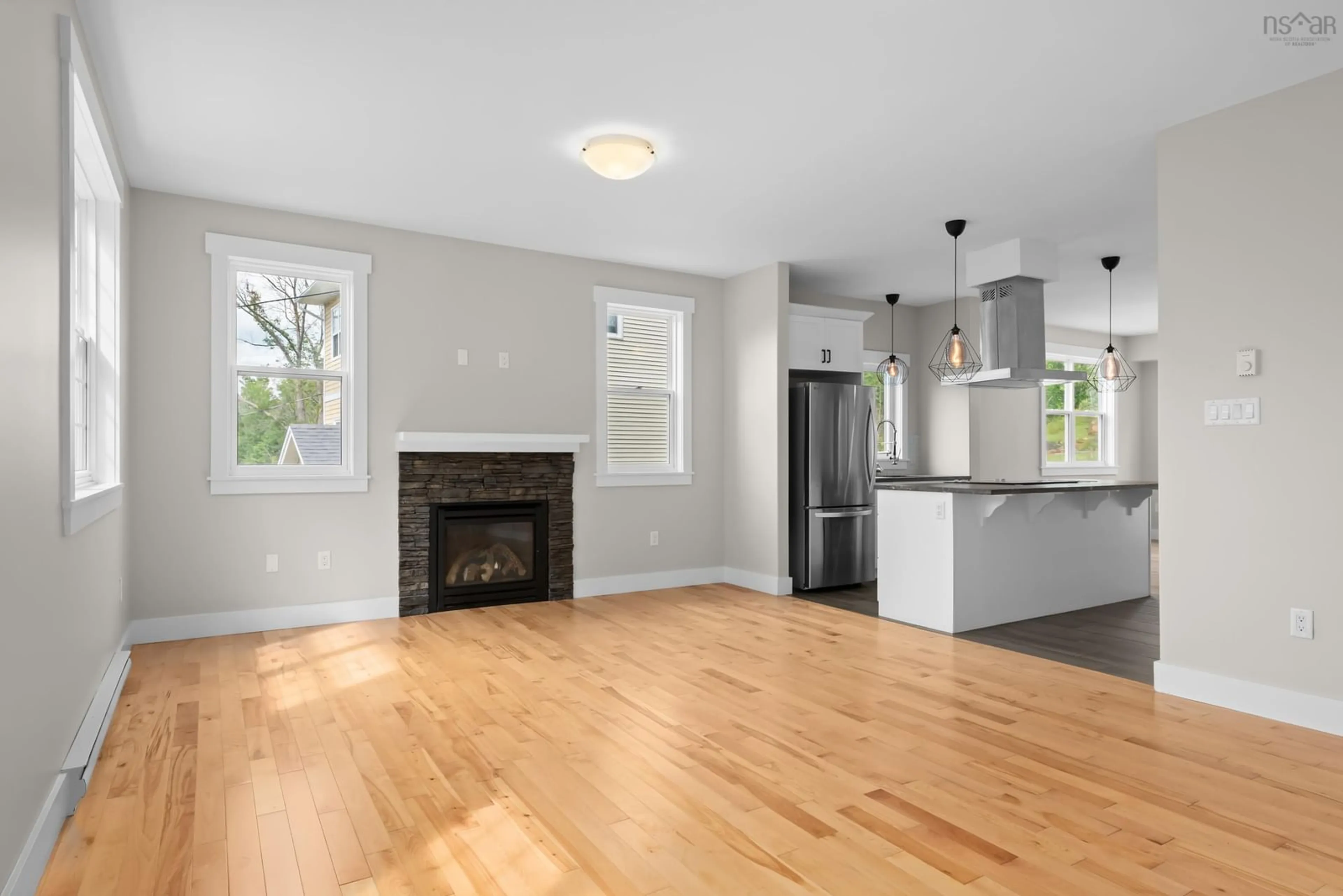 Open concept kitchen, wood/laminate floor for 7 Copperhead Rd, Fall River Nova Scotia B2T 1W2