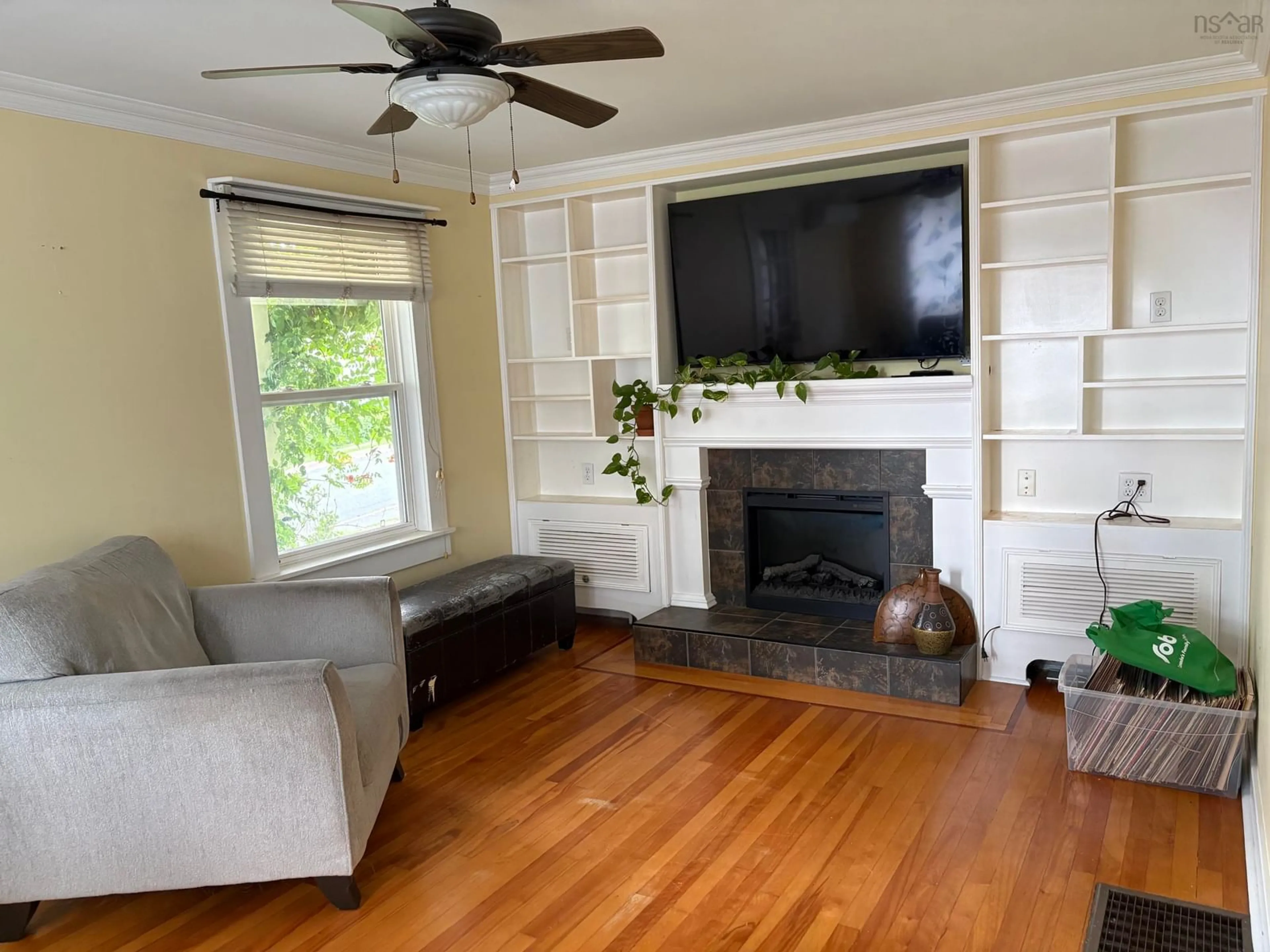 Living room with furniture, wood/laminate floor for 50 Rose Ave, Trenton Nova Scotia B0K 1X0