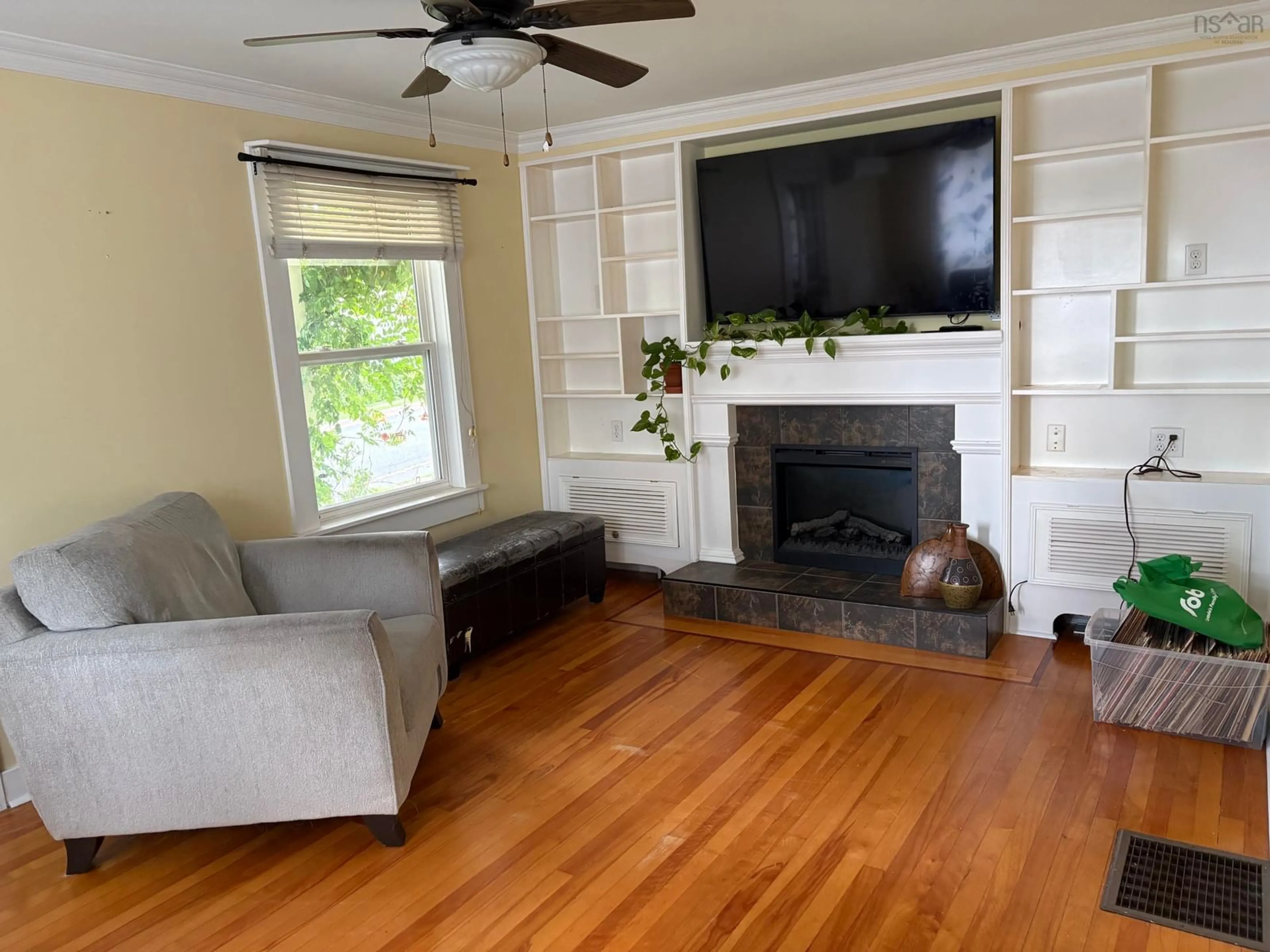 Living room with furniture, wood/laminate floor for 50 Rose Ave, Trenton Nova Scotia B0K 1X0