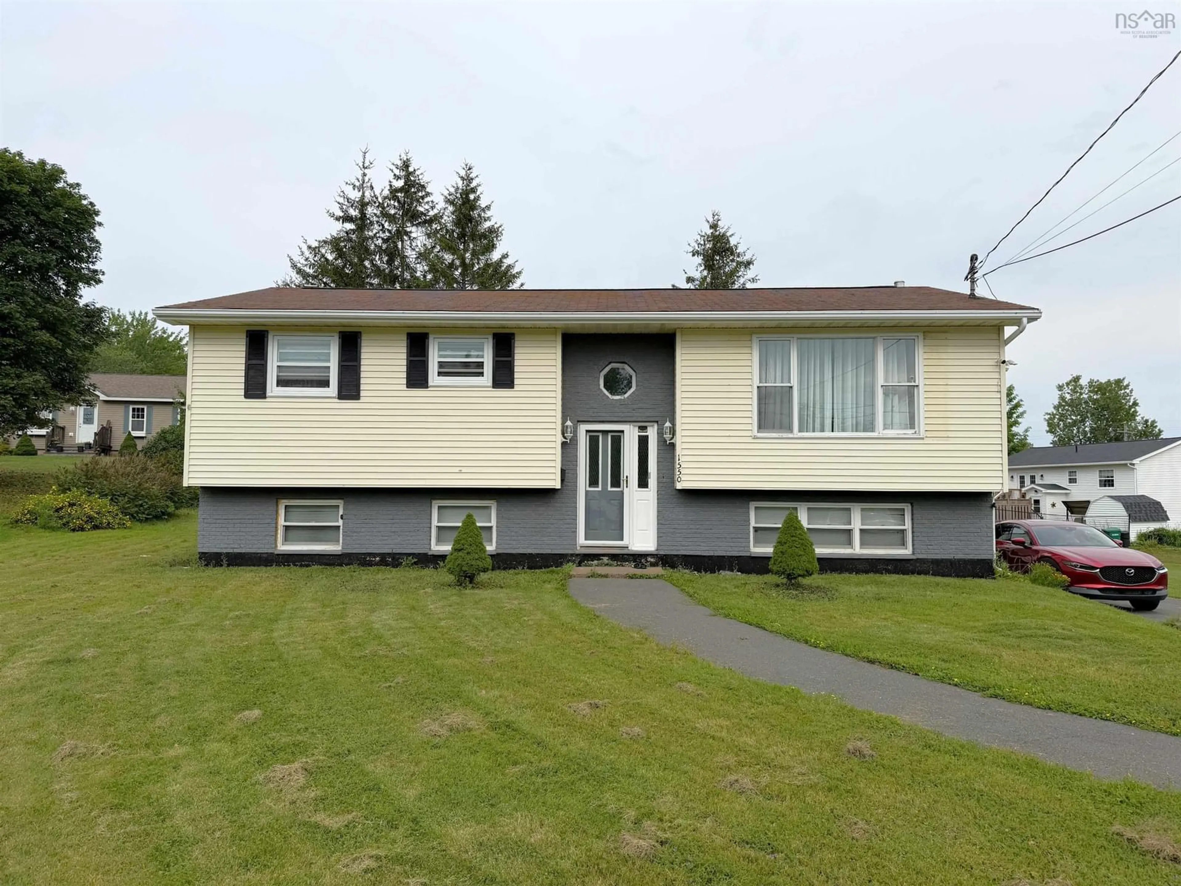 Home with vinyl exterior material, street for 1550 North Main St, Westville Nova Scotia B0K 2A0
