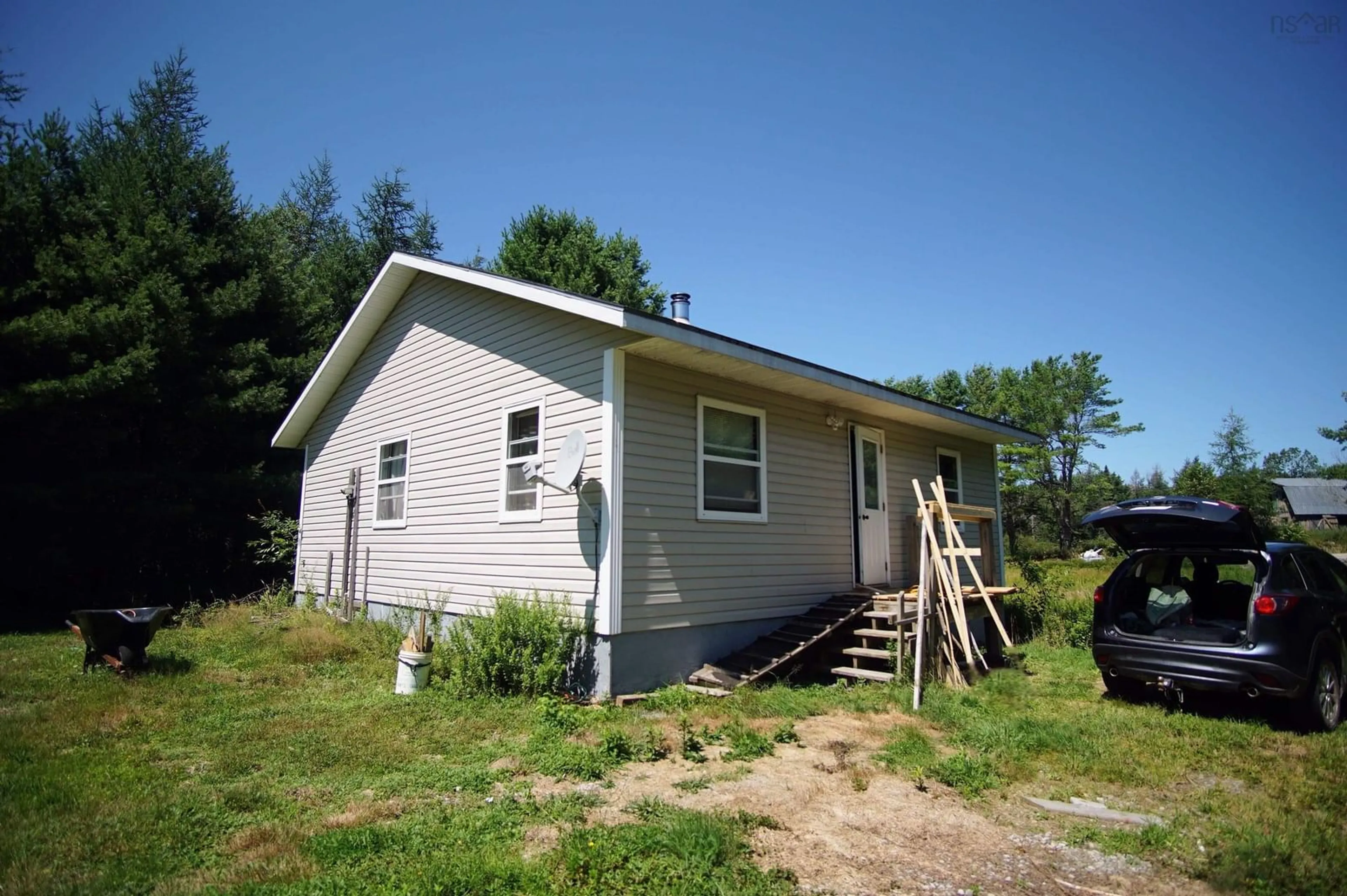 Home with vinyl exterior material, building for 6816 Upper Clyde Rd, Upper Clyde River Nova Scotia B0T 1W0