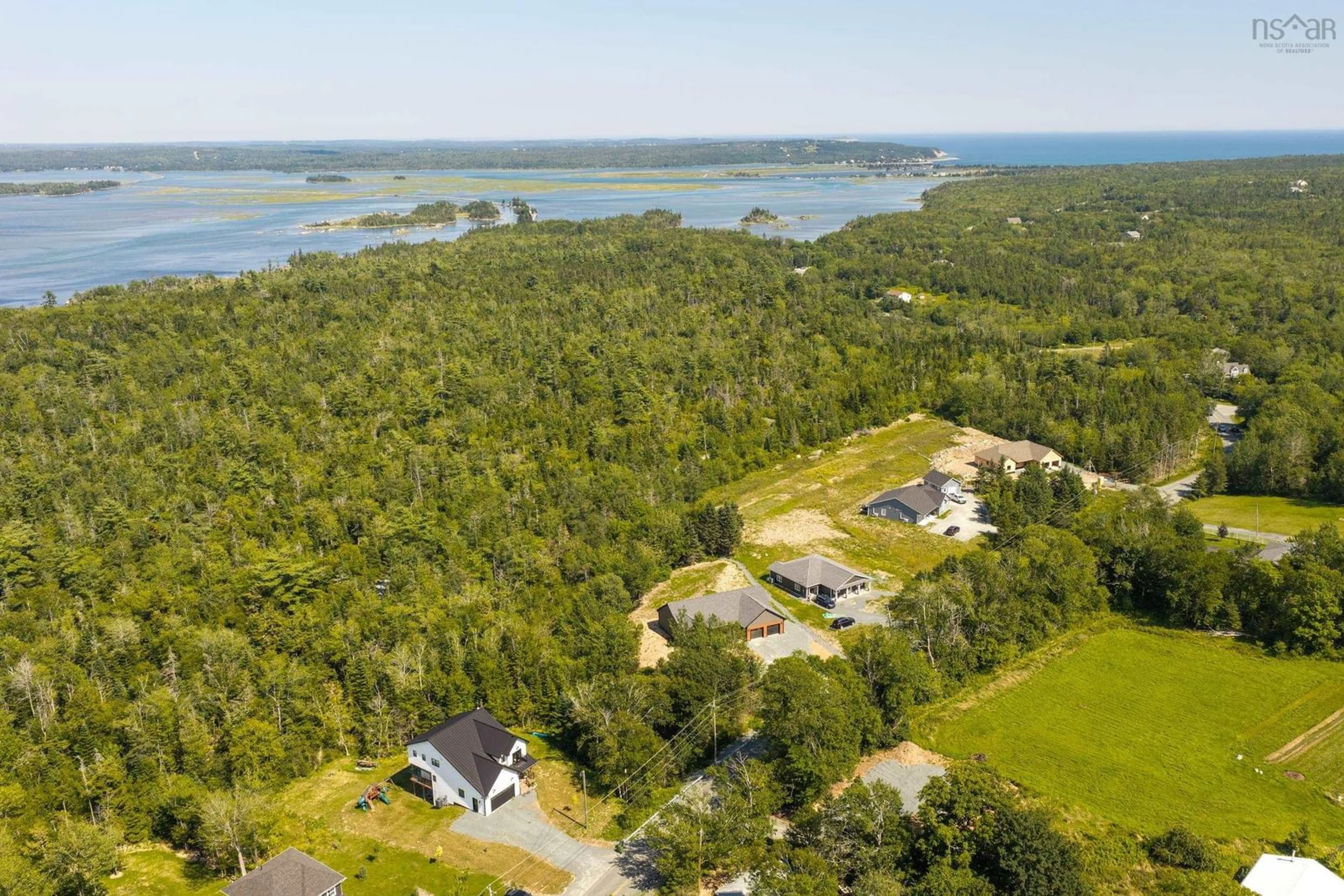 A pic from outside/outdoor area/front of a property/back of a property/a pic from drone, water/lake/river/ocean view for 642 Bissett Rd, Cole Harbour Nova Scotia B2V 2T5