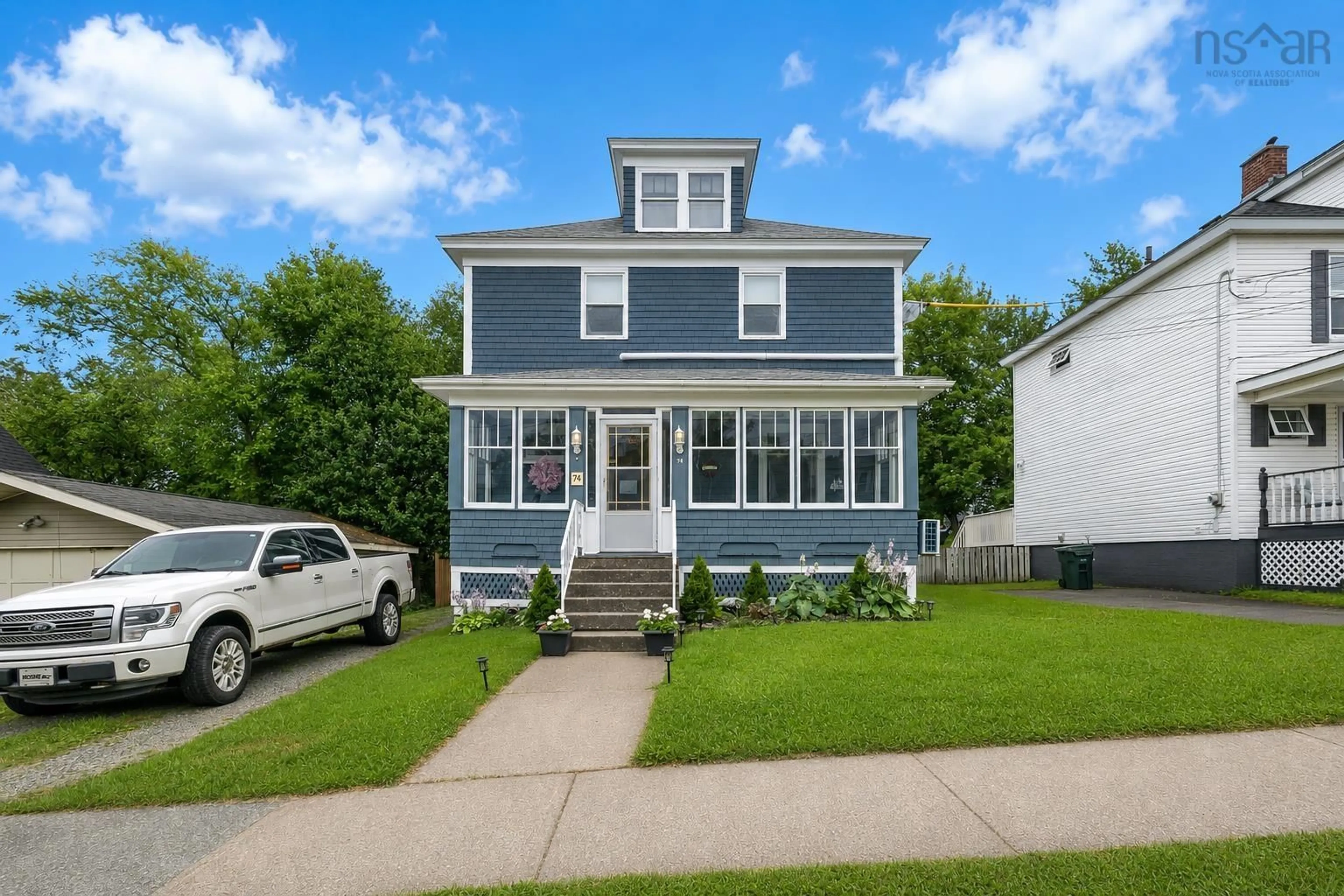 Home with vinyl exterior material, street for 74 Oxford St, Sydney Nova Scotia B1P 4C6