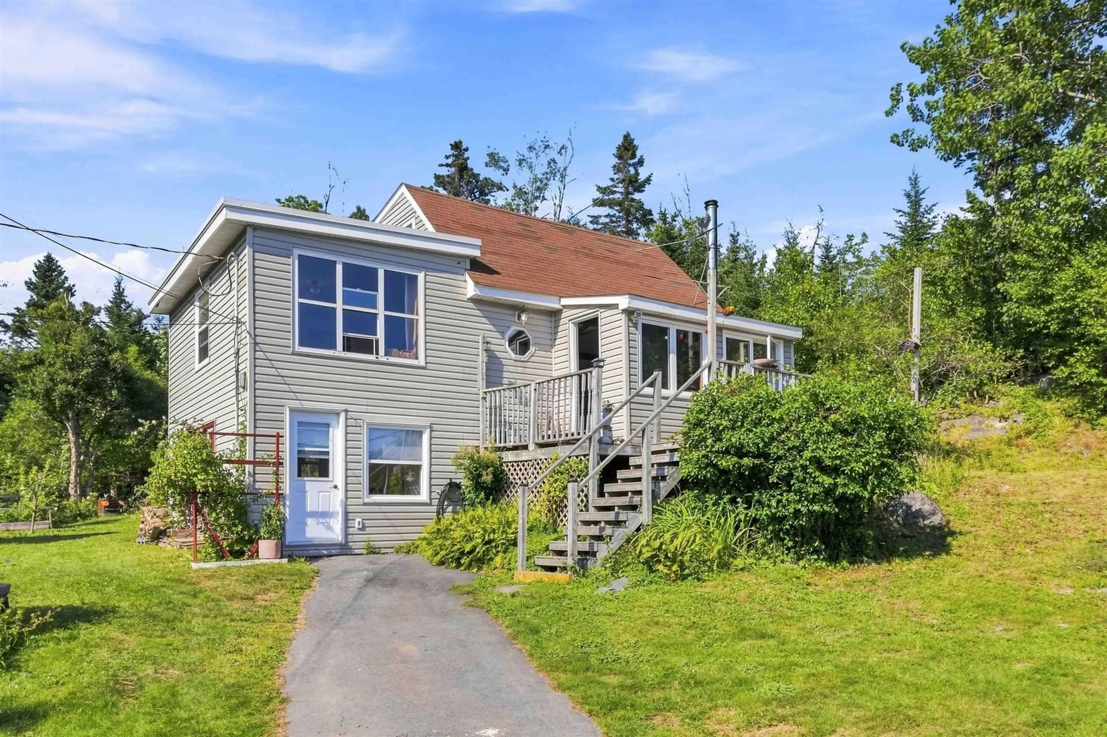 Home with vinyl exterior material, street for 2559 Lawrencetown Rd, Lawrencetown Nova Scotia B2Z 1L1