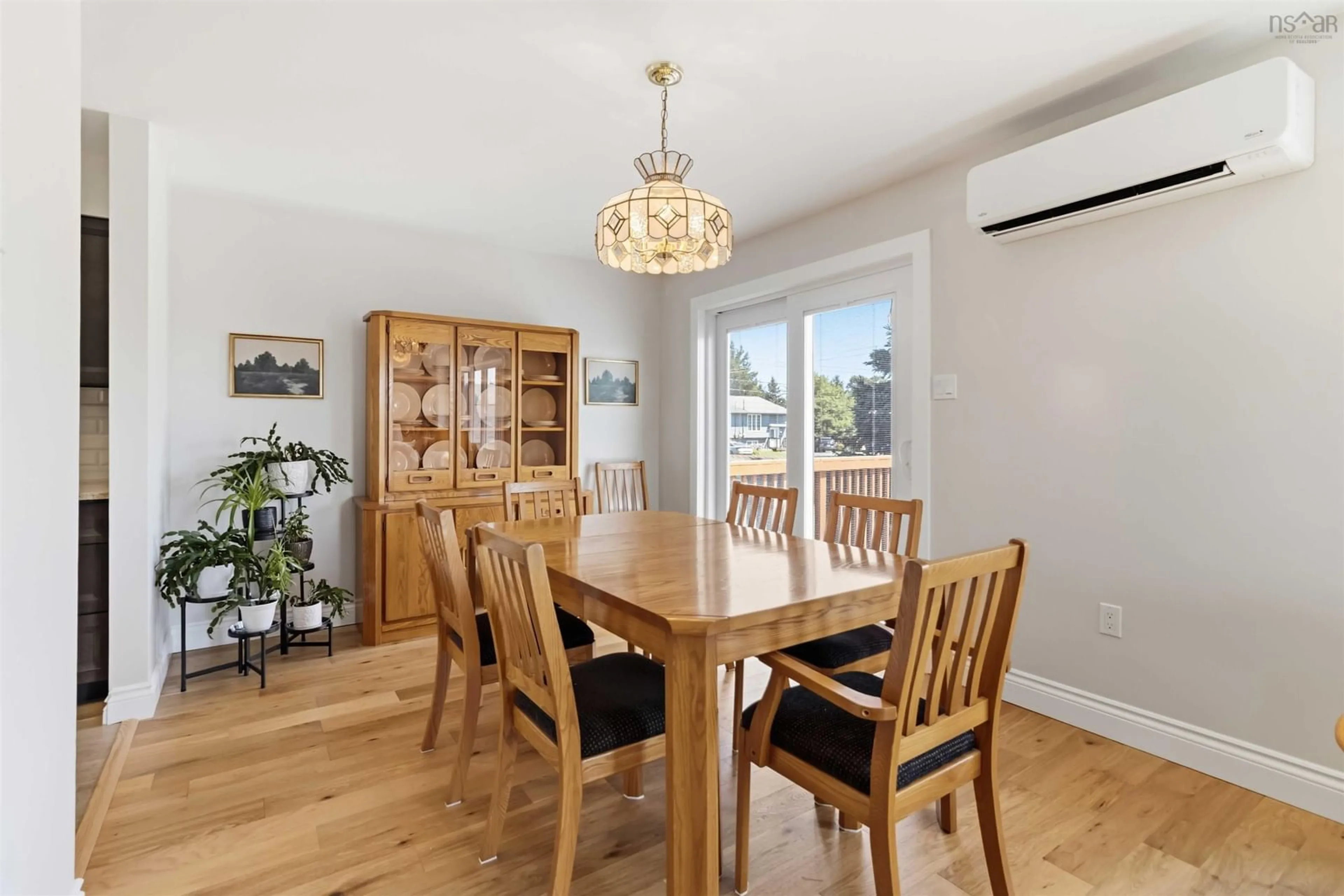 Dining room, wood/laminate floor for 281 Cow Bay Rd, Eastern Passage Nova Scotia B3G 1C4