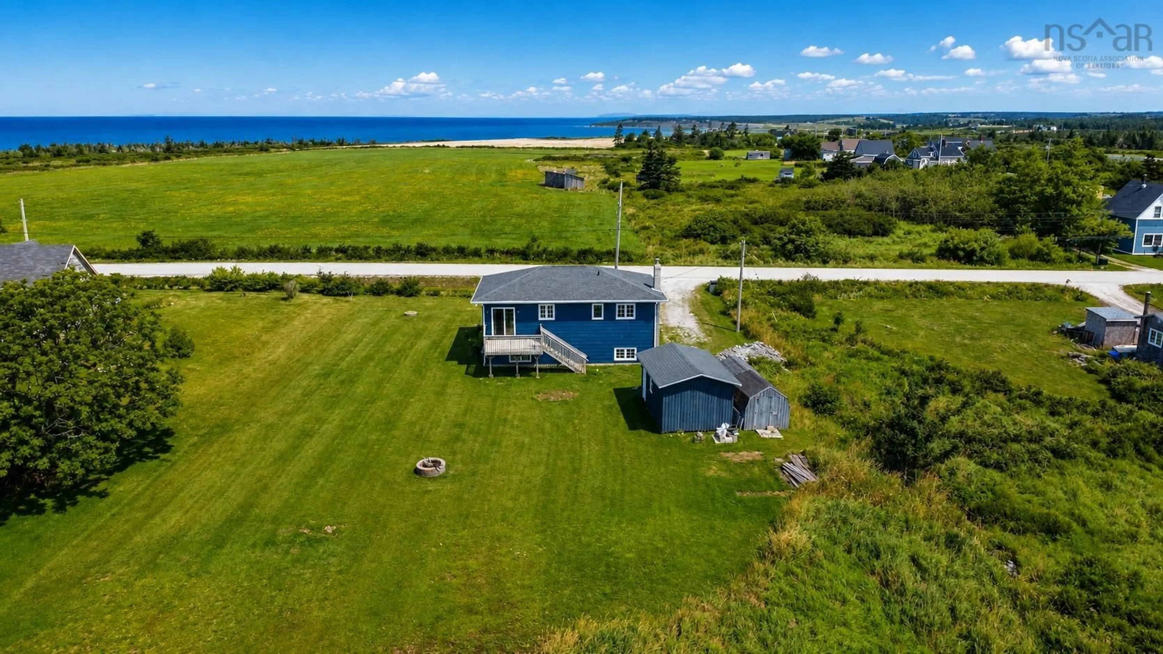 A pic from outside/outdoor area/front of a property/back of a property/a pic from drone, water/lake/river/ocean view for 37 Chegoggin Point Rd, Pembroke Nova Scotia B5A 5G9