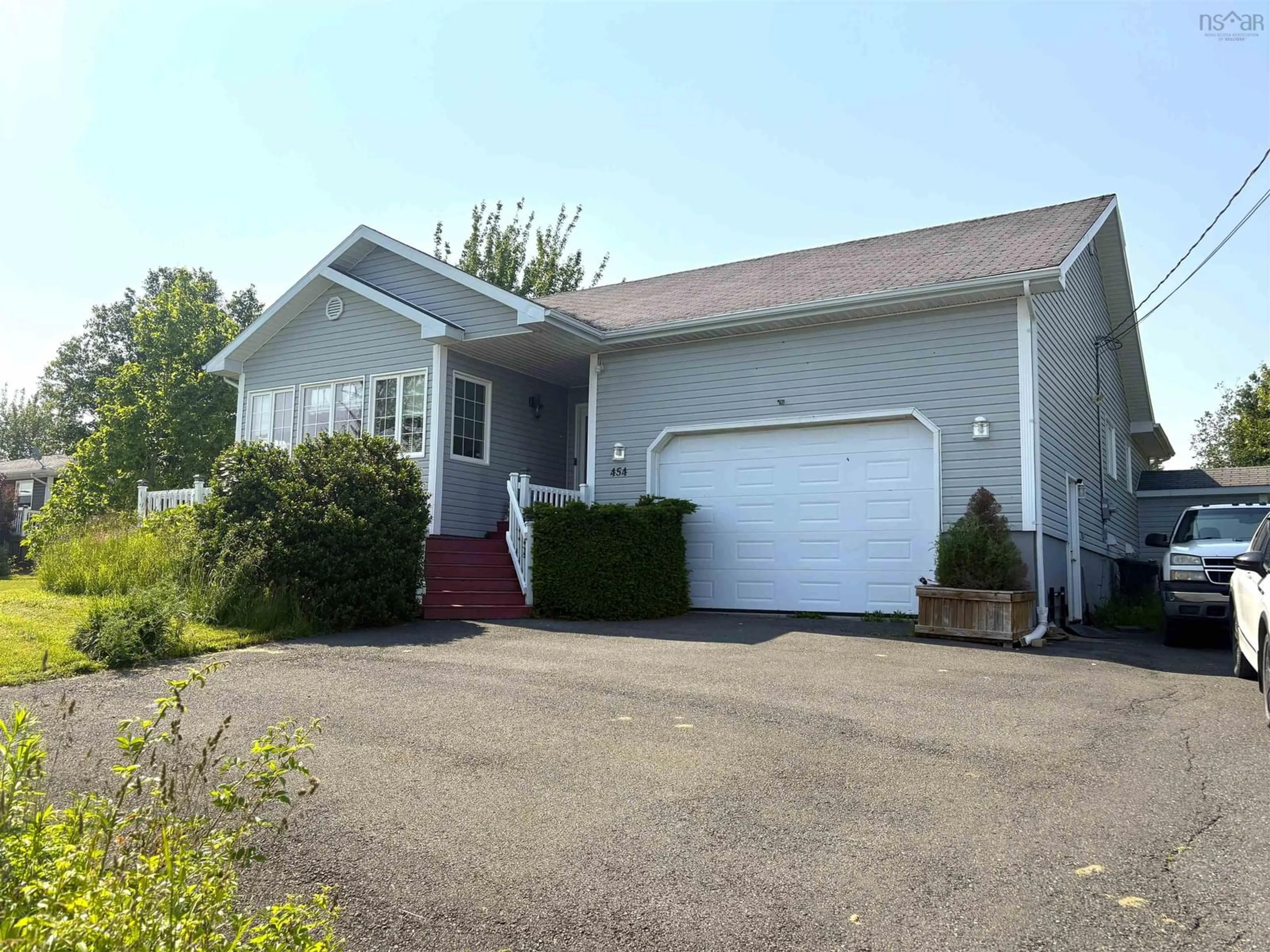 Home with vinyl exterior material, street for 454 Hillside Boularderie Rd, Groves Point Nova Scotia B1Y 2W4