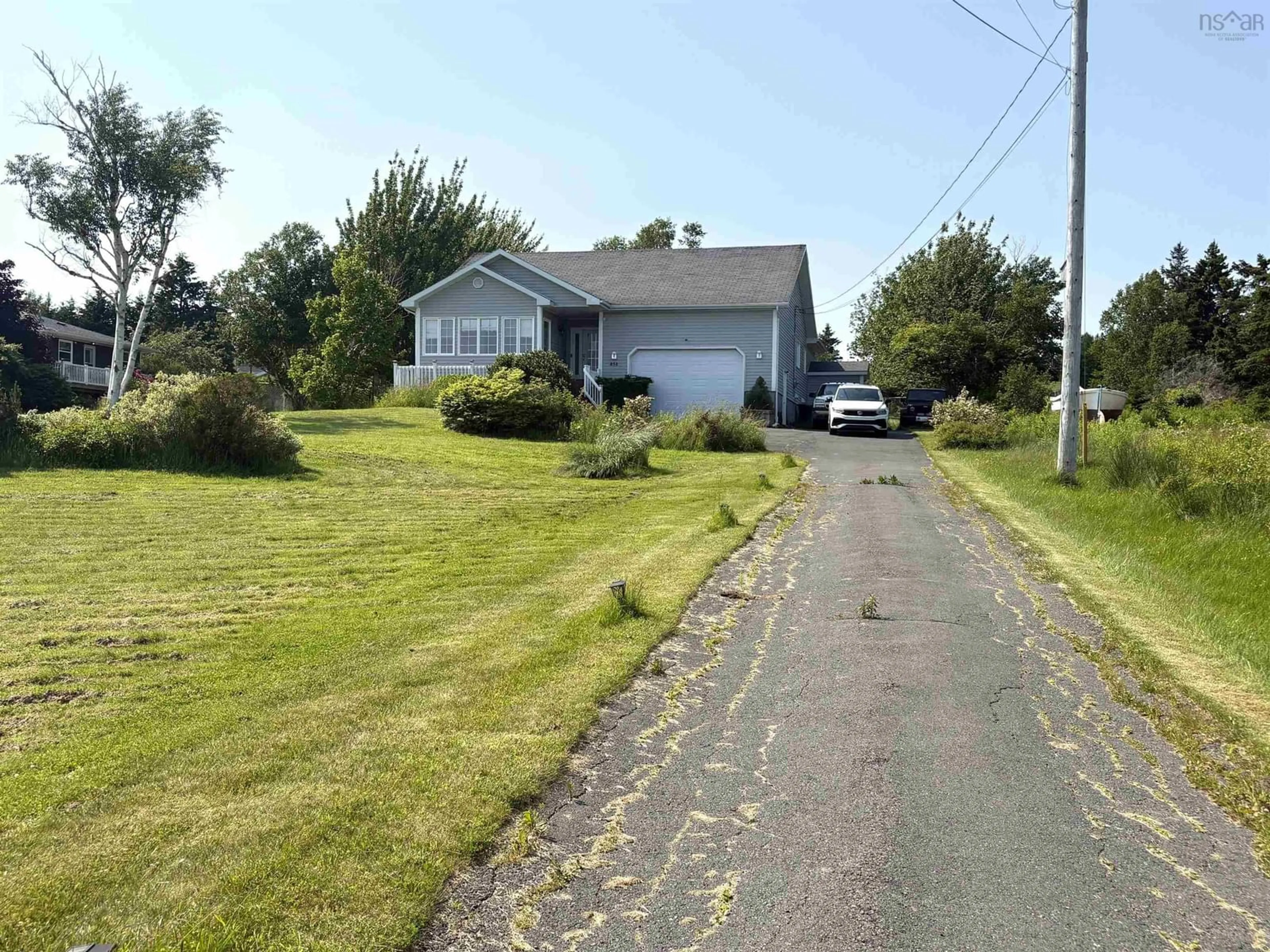 A pic from outside/outdoor area/front of a property/back of a property/a pic from drone, street for 454 Hillside Boularderie Rd, Groves Point Nova Scotia B1Y 2W4