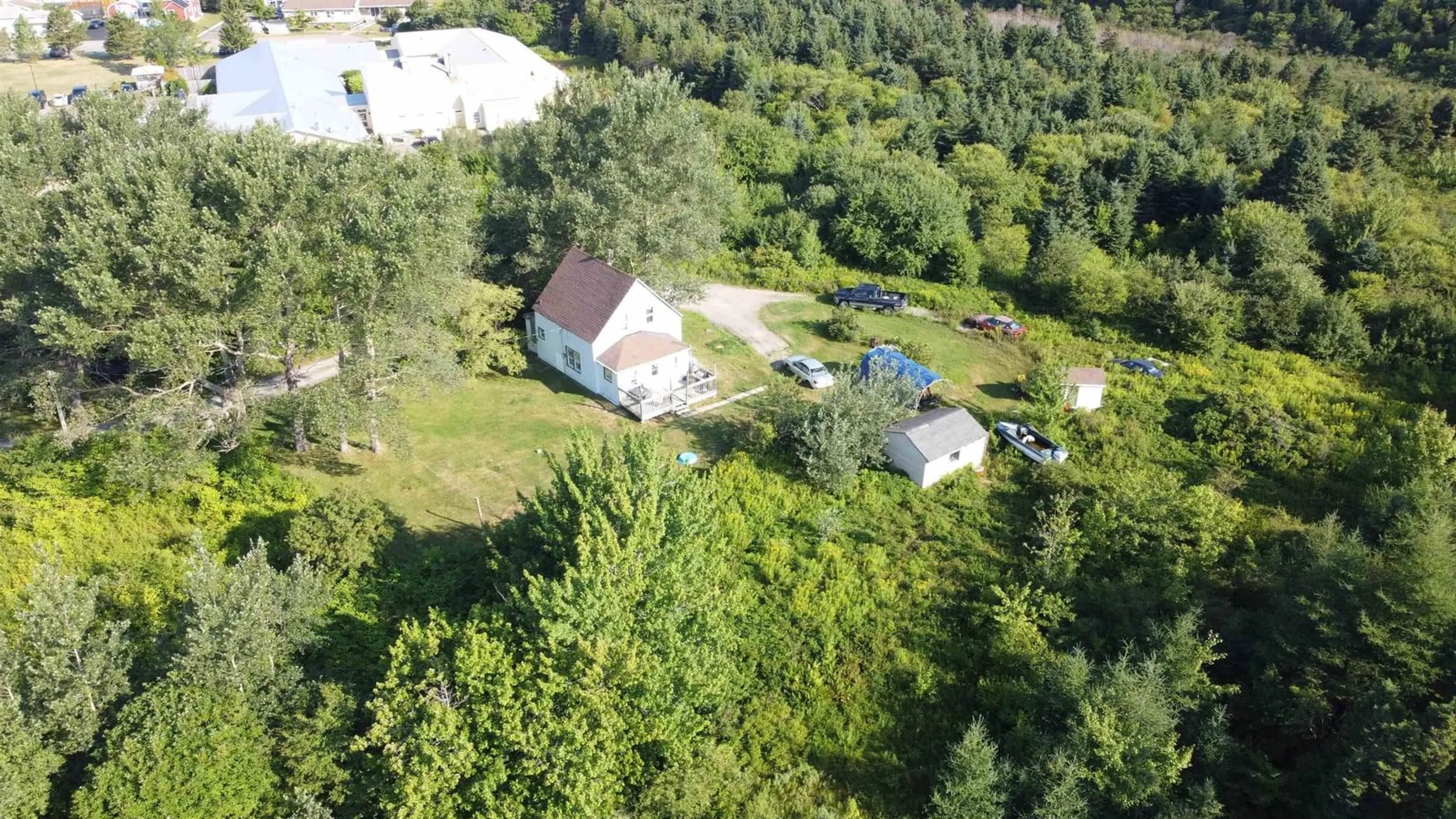 A pic from outside/outdoor area/front of a property/back of a property/a pic from drone, unknown for 6 Macquarrie Drive Exten, Port Hawkesbury Nova Scotia B9A 3S9