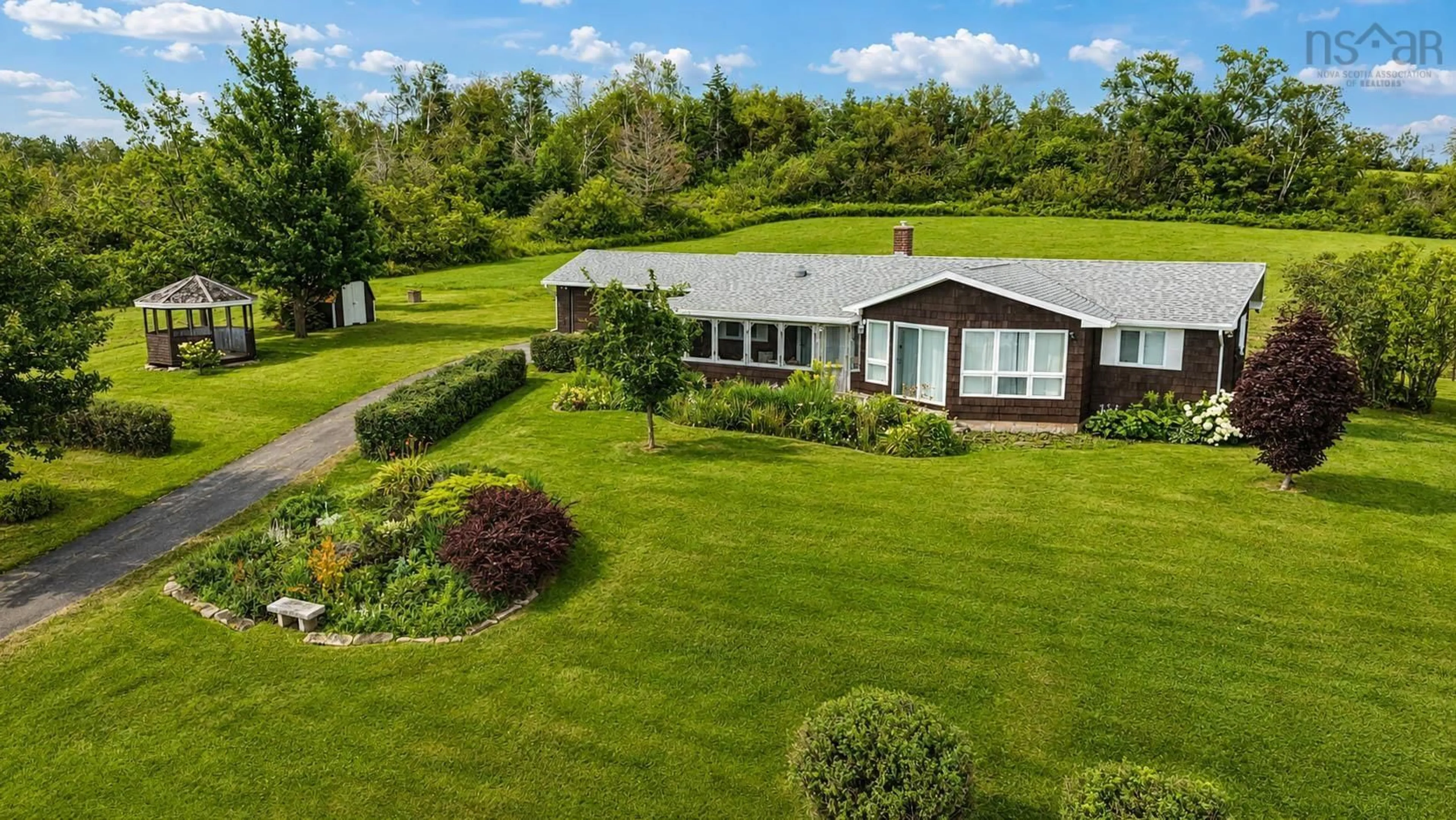 A pic from outside/outdoor area/front of a property/back of a property/a pic from drone, unknown for 1952 Shore Rd, Merigomish Nova Scotia B0K 1G0