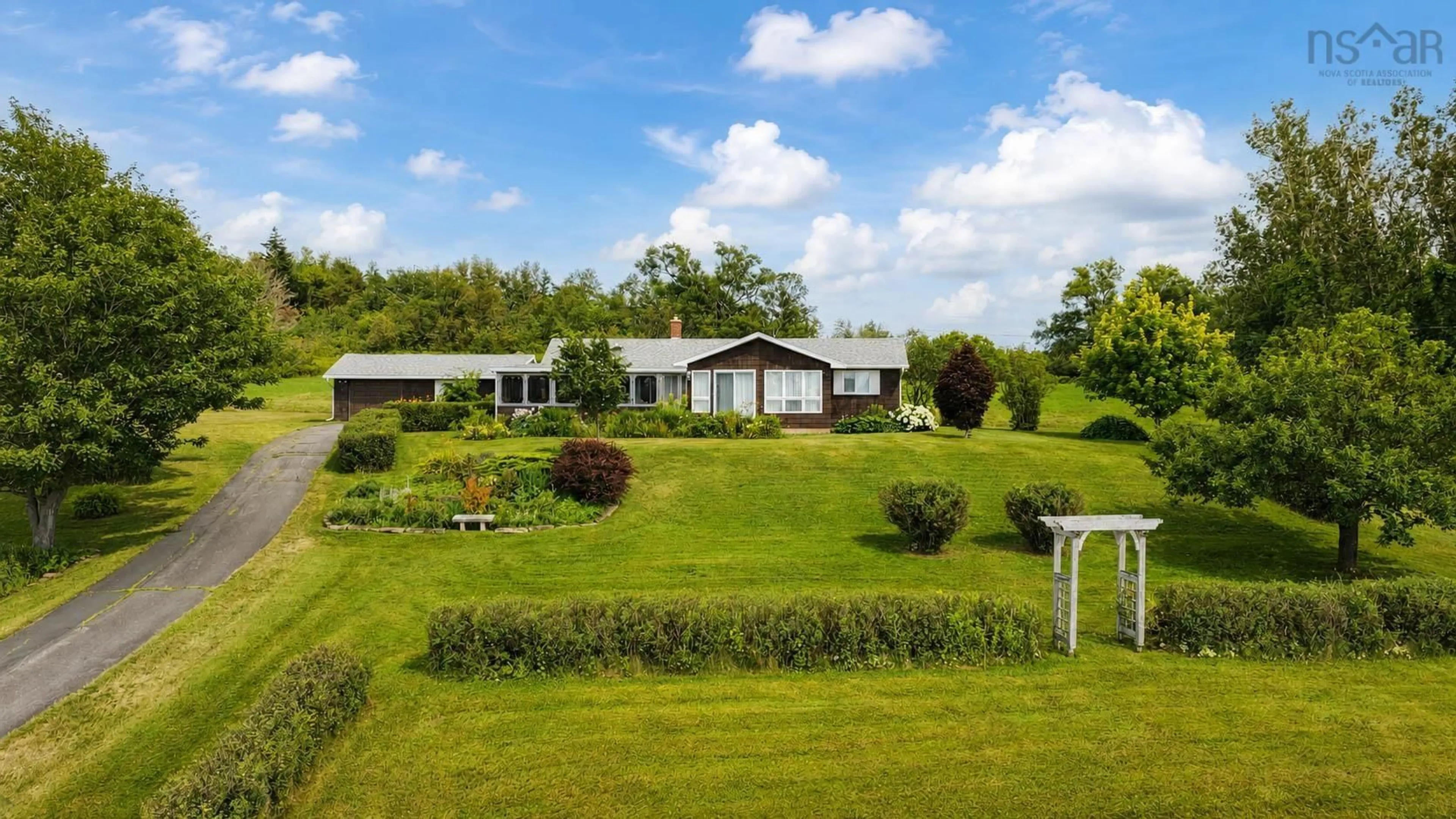 A pic from outside/outdoor area/front of a property/back of a property/a pic from drone, unknown for 1952 Shore Rd, Merigomish Nova Scotia B0K 1G0