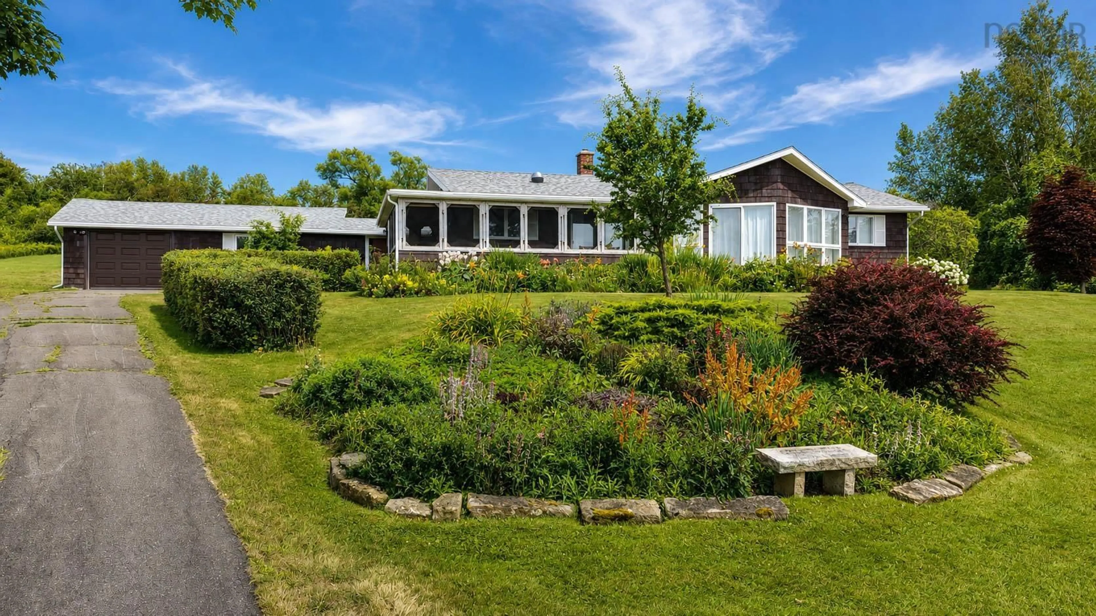A pic from outside/outdoor area/front of a property/back of a property/a pic from drone, water/lake/river/ocean view for 1952 Shore Rd, Merigomish Nova Scotia B0K 1G0