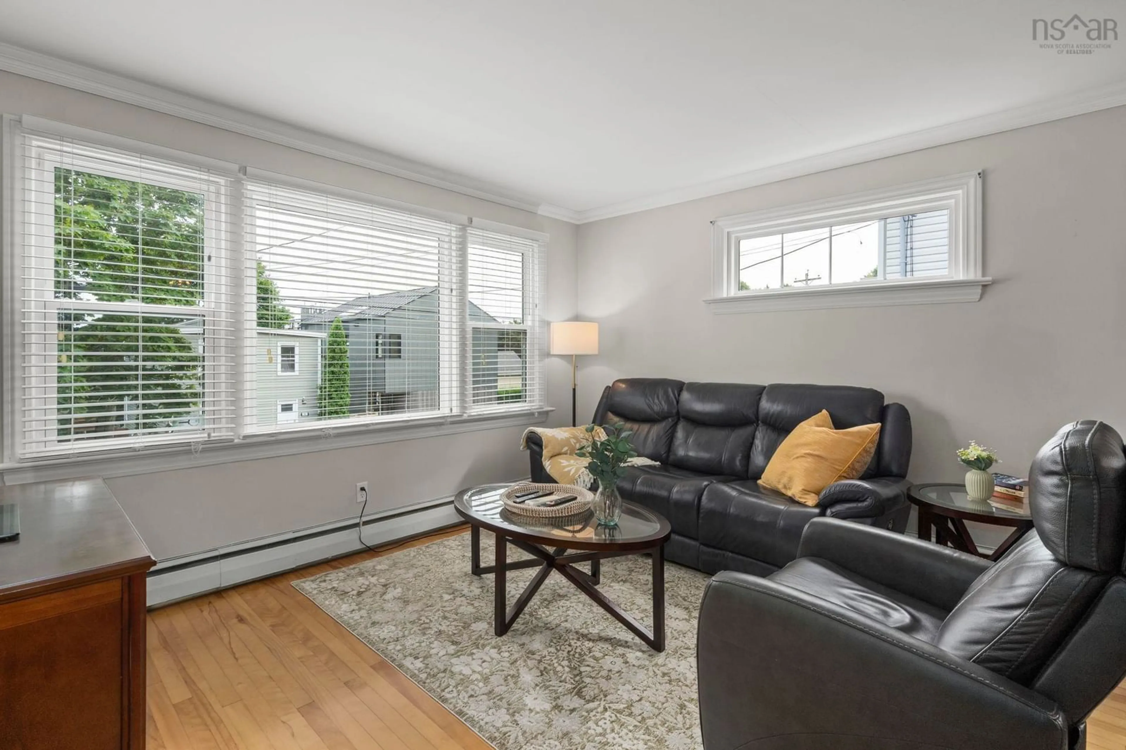 Living room with furniture, wood/laminate floor for 99 Thistle Street, Dartmouth Nova Scotia B3A 2V6