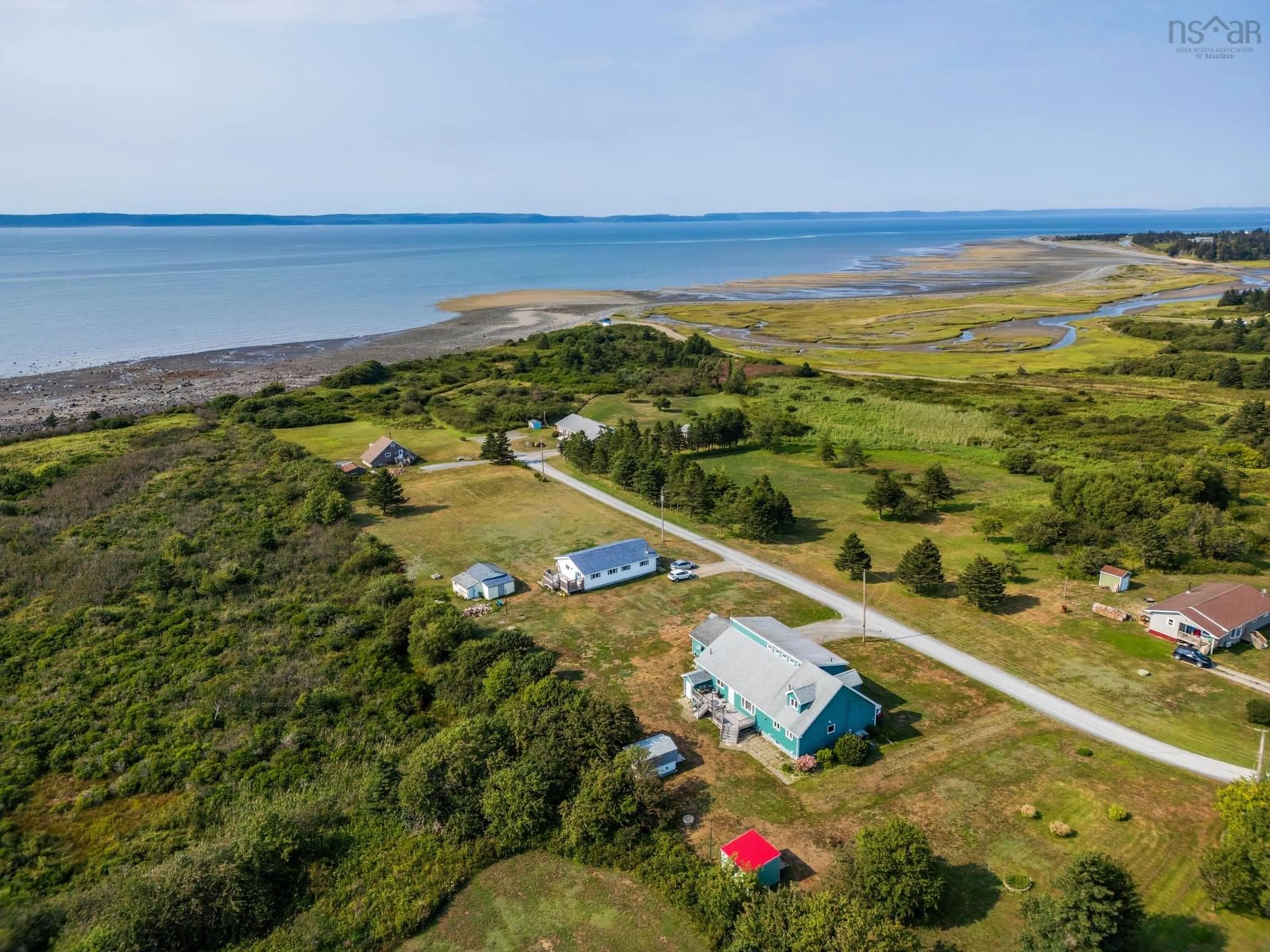 A pic from outside/outdoor area/front of a property/back of a property/a pic from drone, water/lake/river/ocean view for 92 Dixon Rd, Grosses Coques Nova Scotia B0W 1M0
