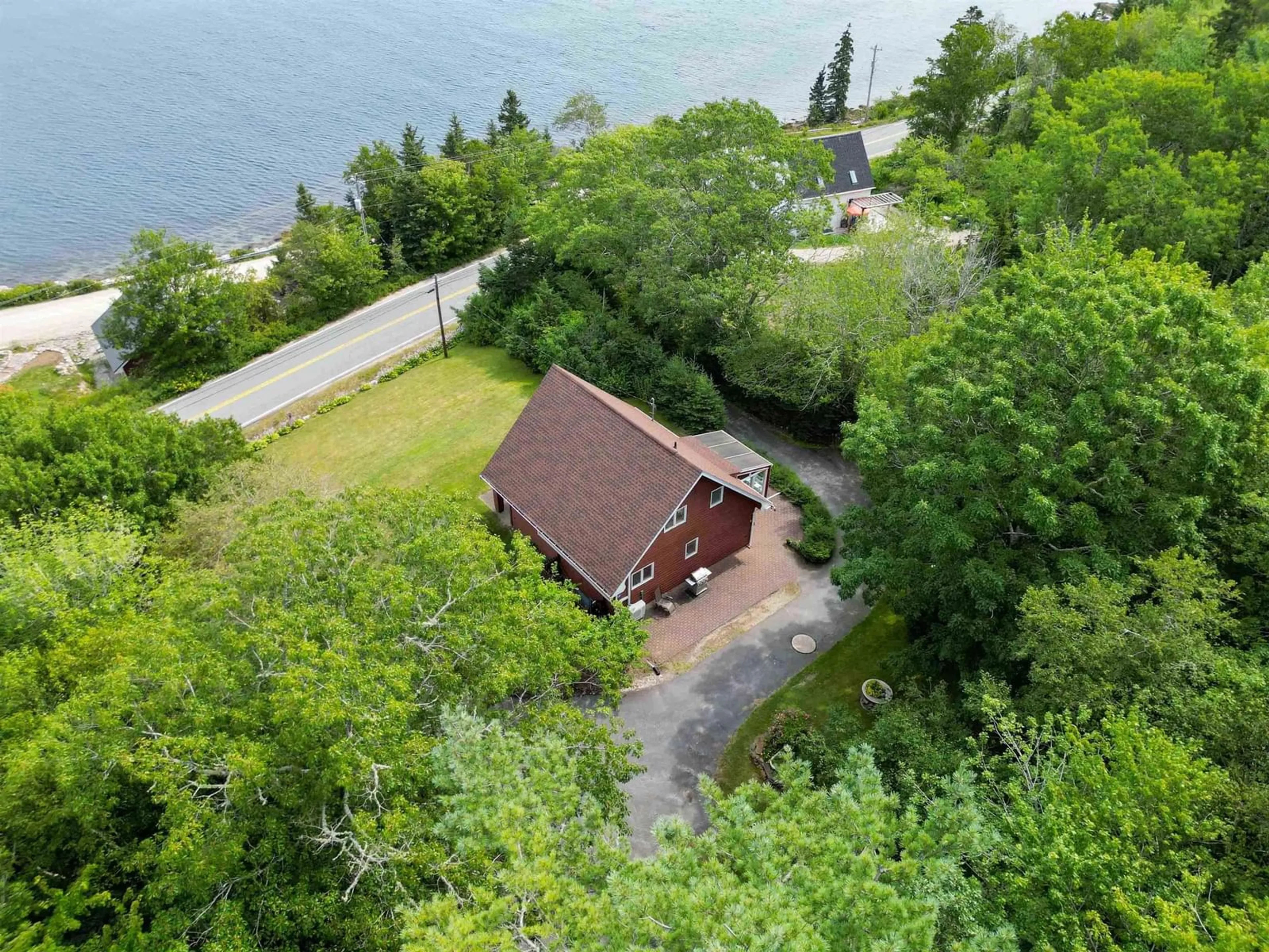 A pic from outside/outdoor area/front of a property/back of a property/a pic from drone, water/lake/river/ocean view for 1558 Highway 329, Birchy Head Nova Scotia B0J 1T0
