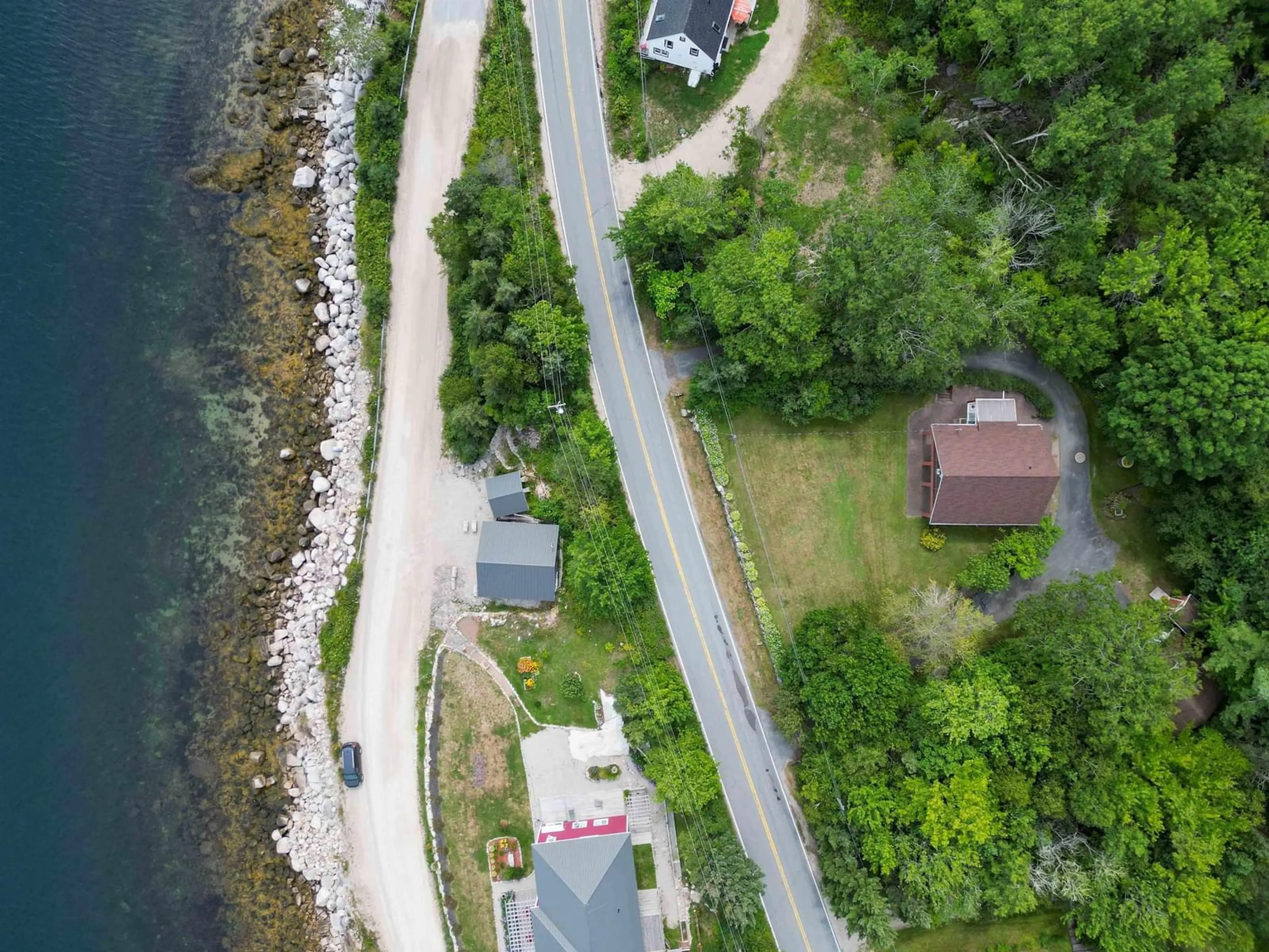 A pic from outside/outdoor area/front of a property/back of a property/a pic from drone, water/lake/river/ocean view for 1558 Highway 329, Birchy Head Nova Scotia B0J 1T0