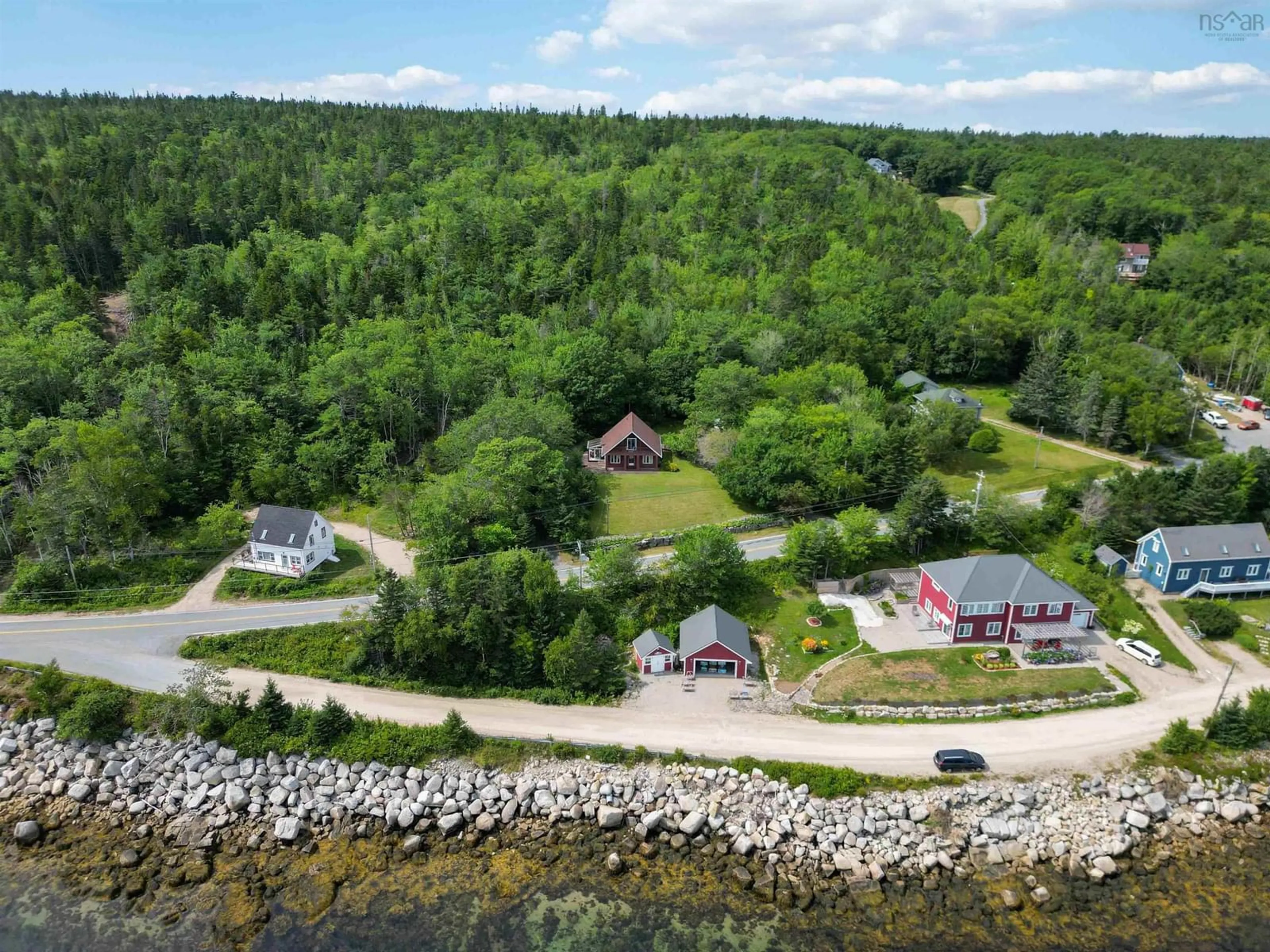 A pic from outside/outdoor area/front of a property/back of a property/a pic from drone, water/lake/river/ocean view for 1558 Highway 329, Birchy Head Nova Scotia B0J 1T0