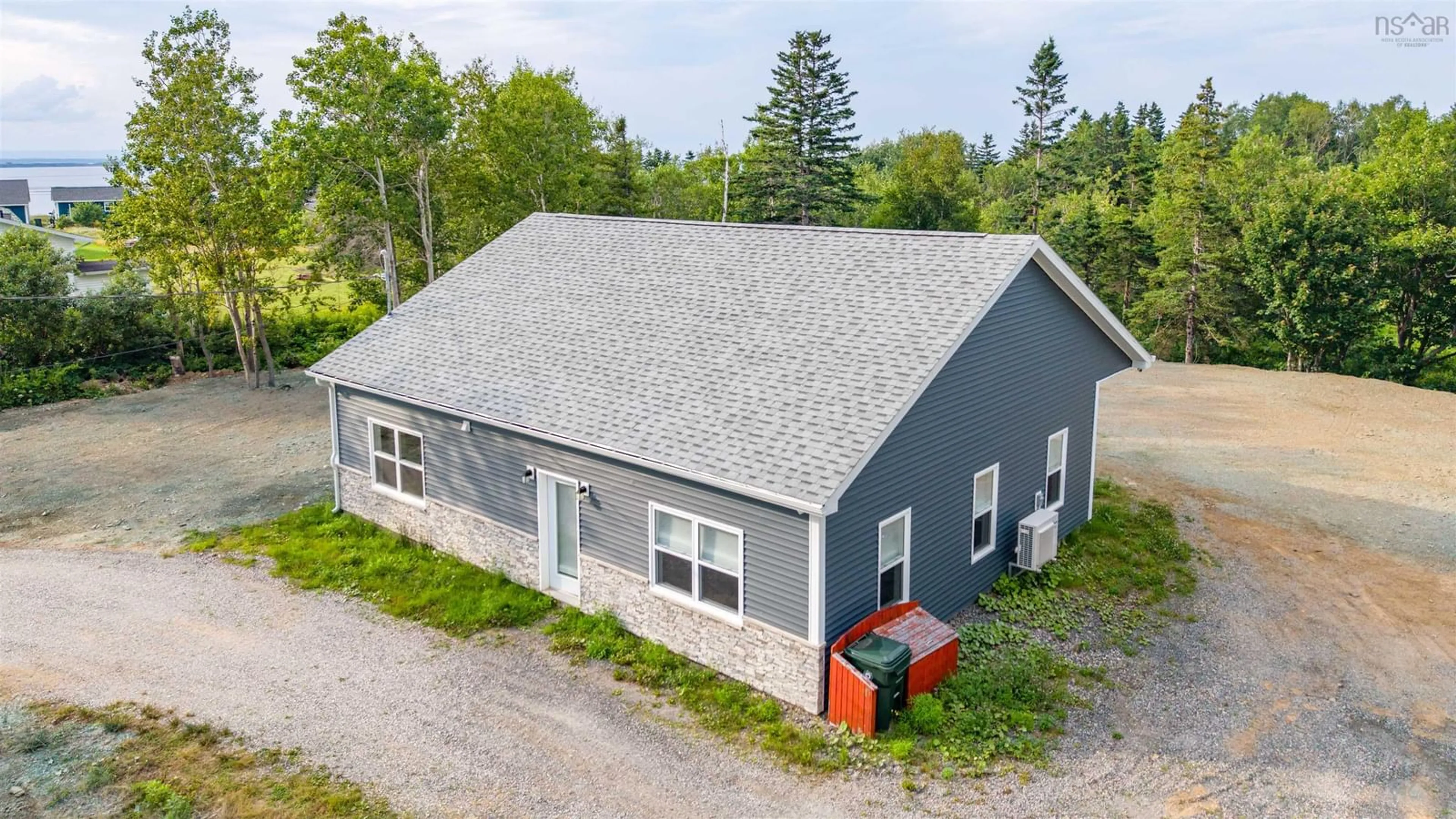 A pic from outside/outdoor area/front of a property/back of a property/a pic from drone, building for 45 Mackessey Dr, Victoria Mines Nova Scotia B1N 3J7