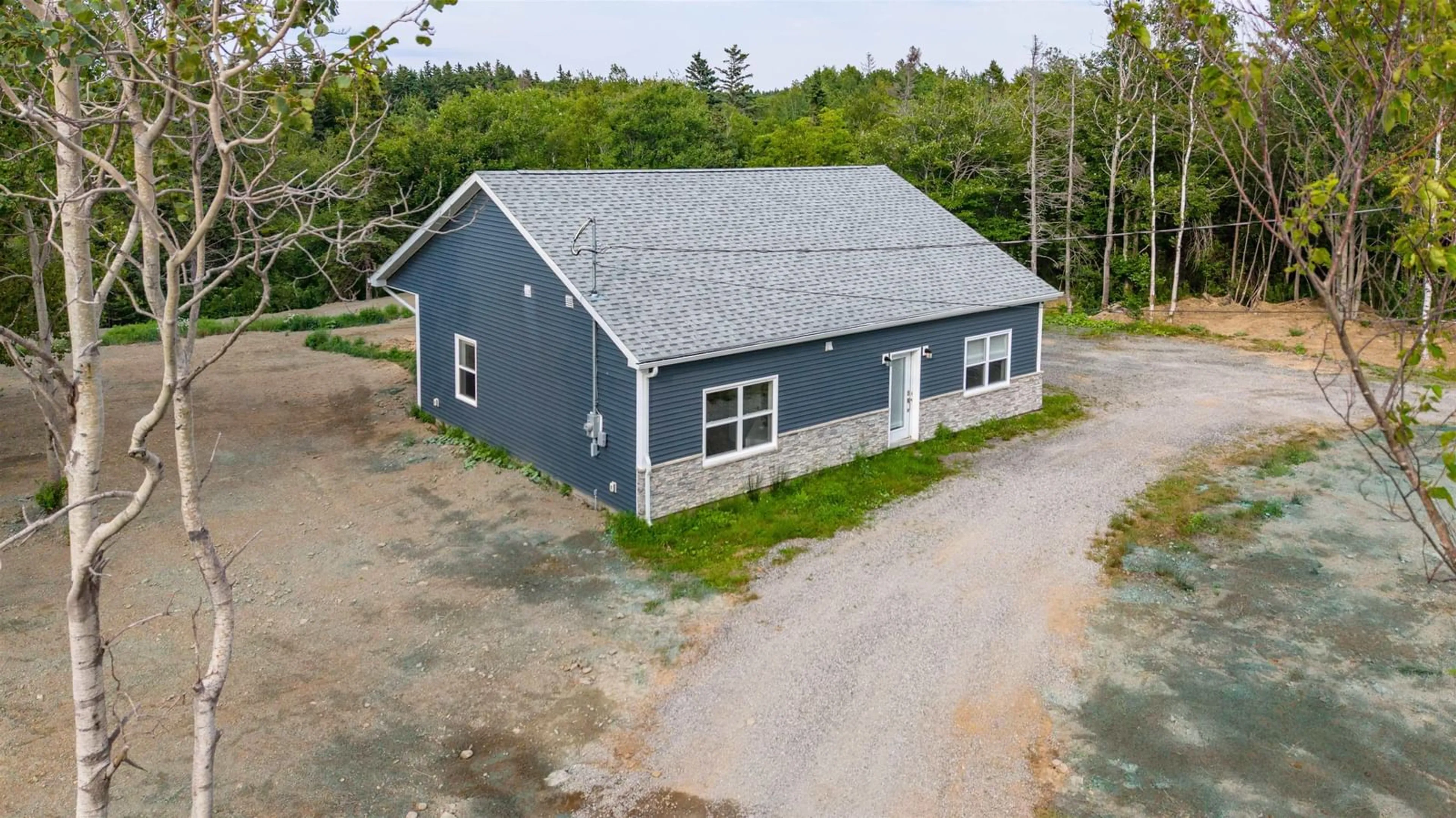 A pic from outside/outdoor area/front of a property/back of a property/a pic from drone, building for 45 Mackessey Dr, Victoria Mines Nova Scotia B1N 3J7