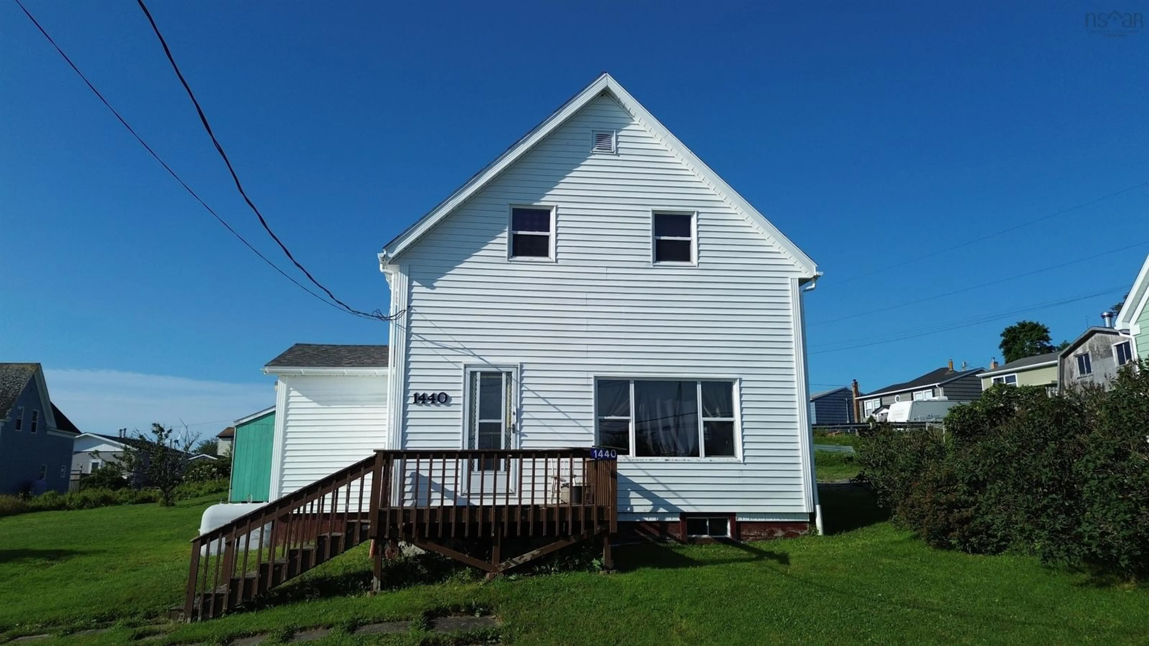Home with vinyl exterior material, street for 1440 Union Street, Canso Nova Scotia B0H 1H0