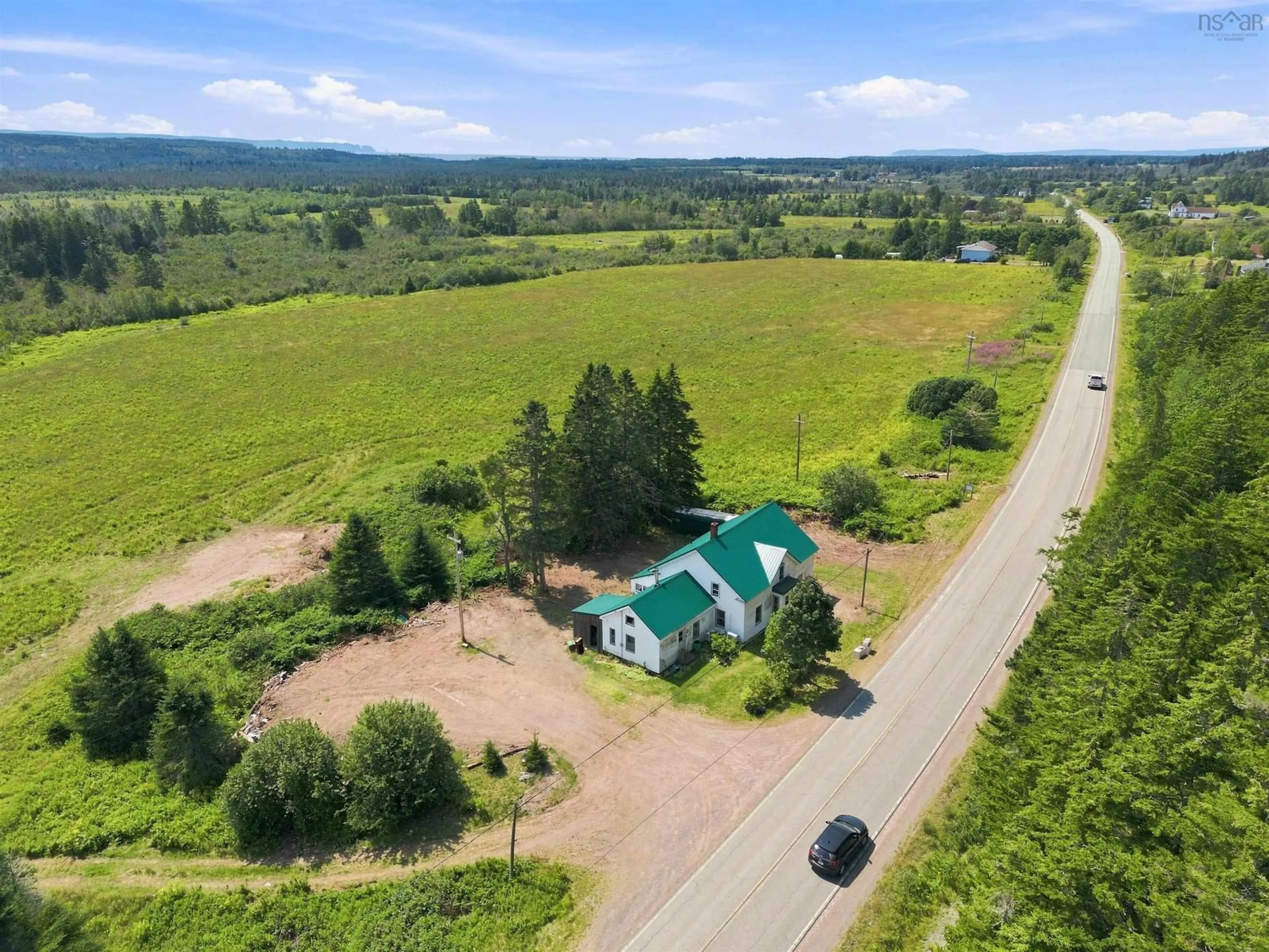 A pic from outside/outdoor area/front of a property/back of a property/a pic from drone, mountain view for 10834 209 Hwy, Wharton Nova Scotia B0M 1S0