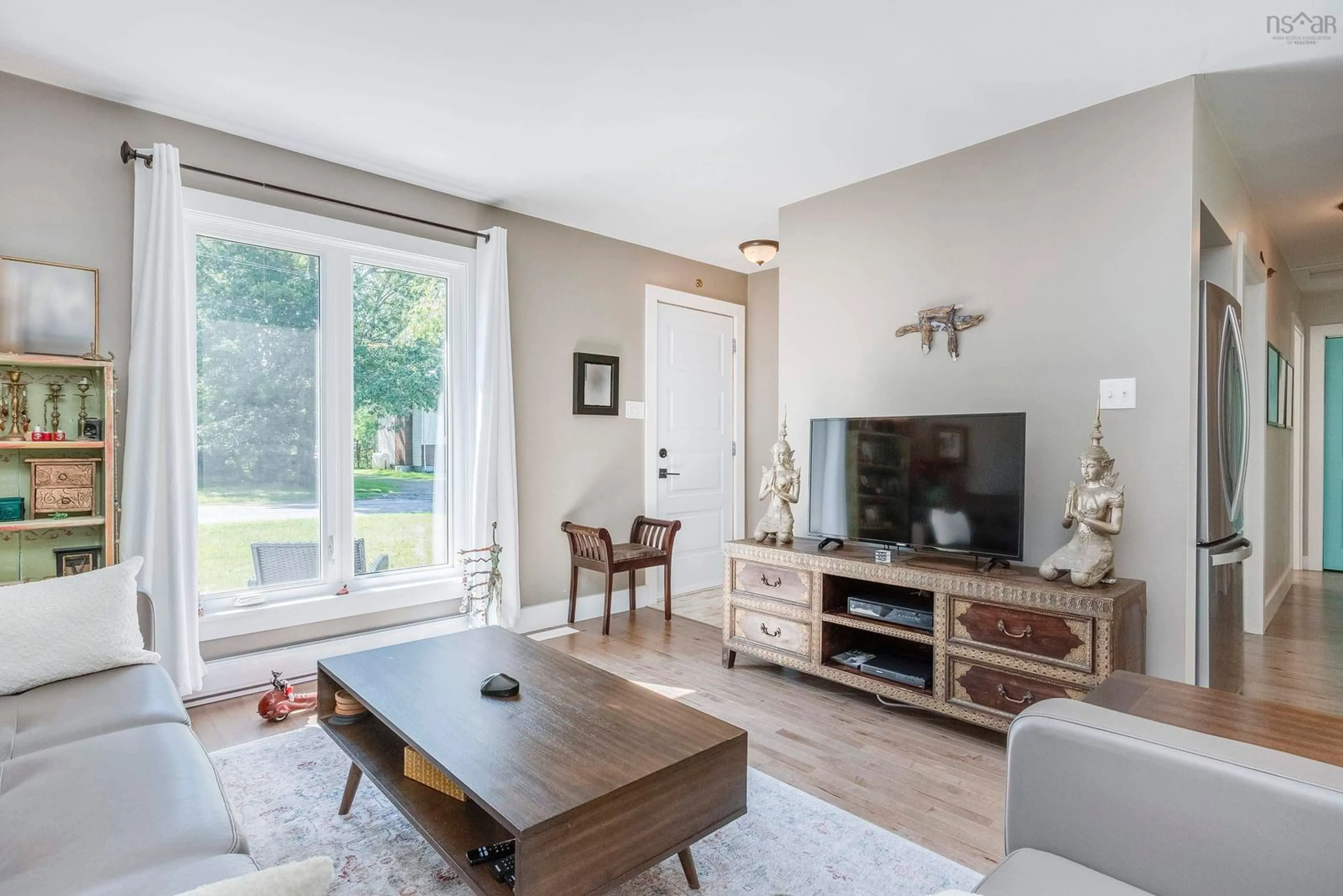 Living room with furniture, wood/laminate floor for 192 Foster St, Berwick Nova Scotia B0P 1E0