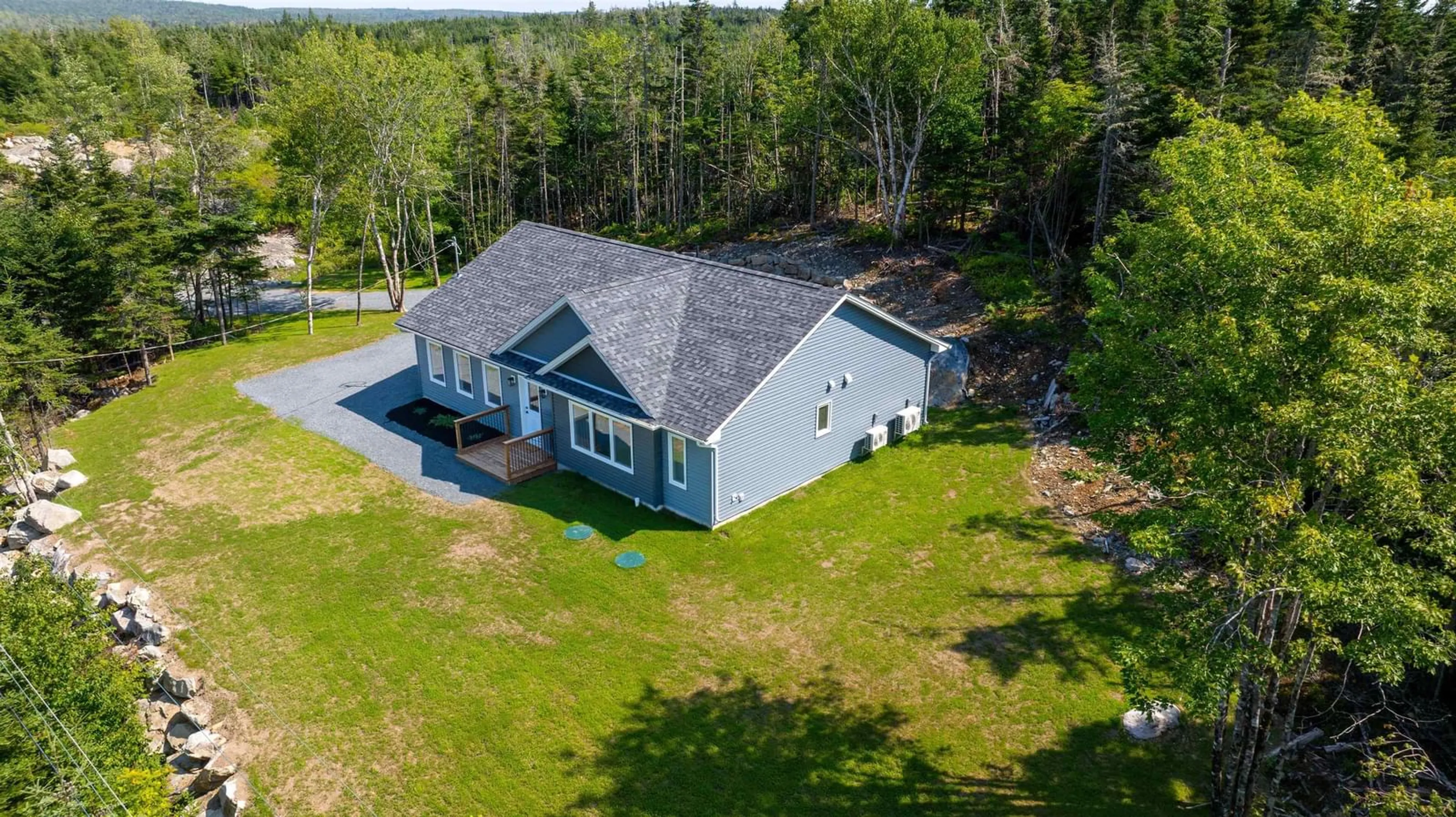 A pic from outside/outdoor area/front of a property/back of a property/a pic from drone, unknown for 10546 Highway 7 Hwy, Oyster Pond Nova Scotia B0J 2L0