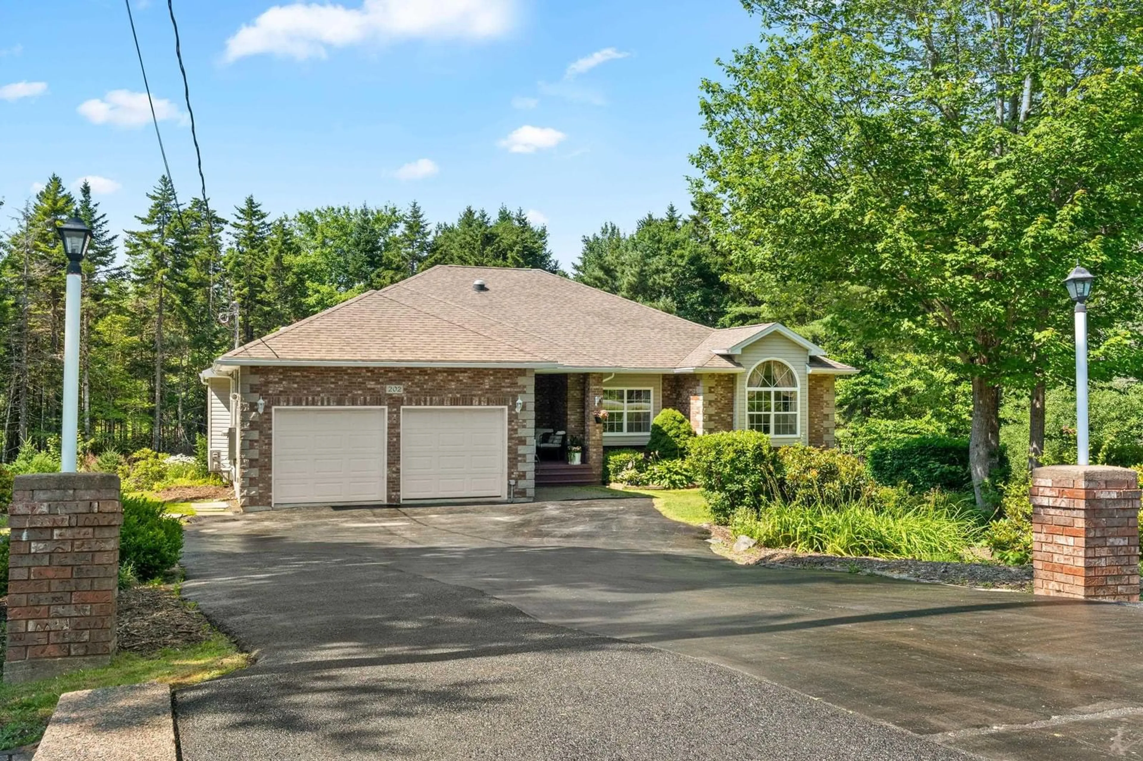 A pic from outside/outdoor area/front of a property/back of a property/a pic from drone, street for 202 Glen Arbour Way, Hammonds Plains Nova Scotia B4B 1T5