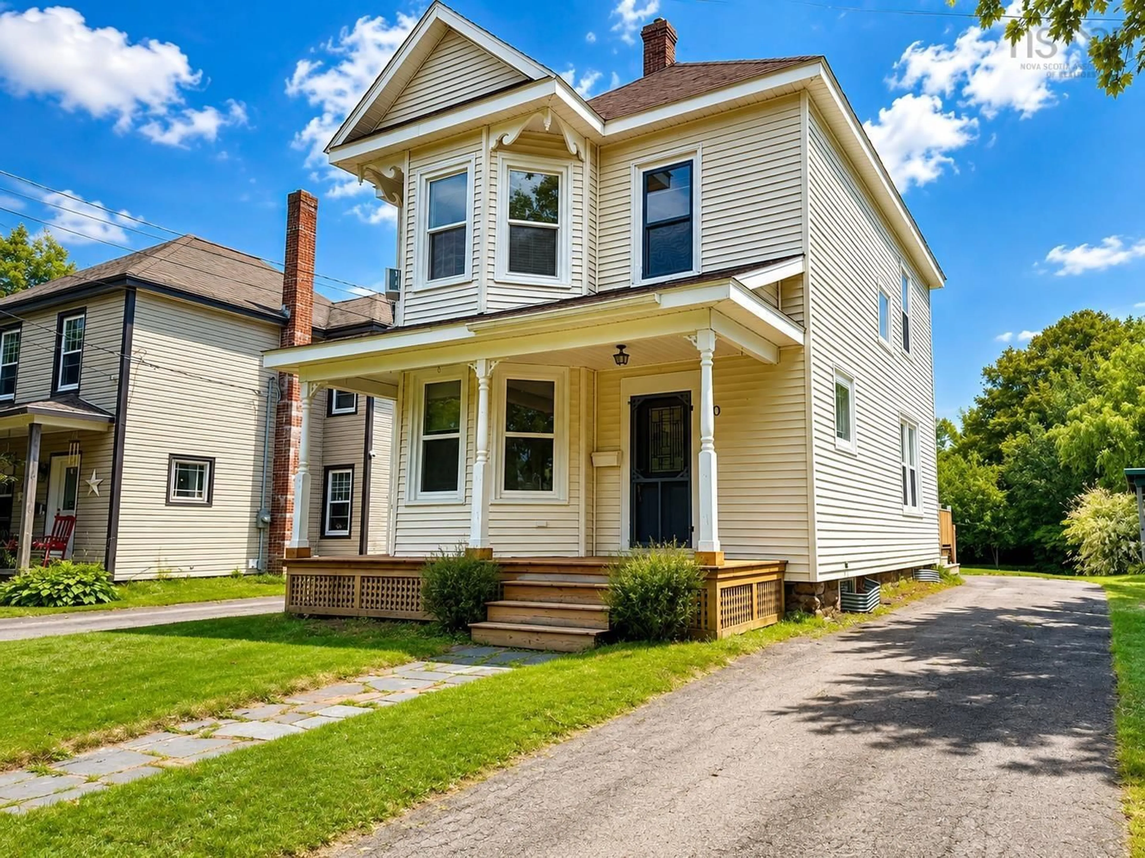 Home with vinyl exterior material, street for 20 Agnew St, Amherst Nova Scotia B4H 2B6