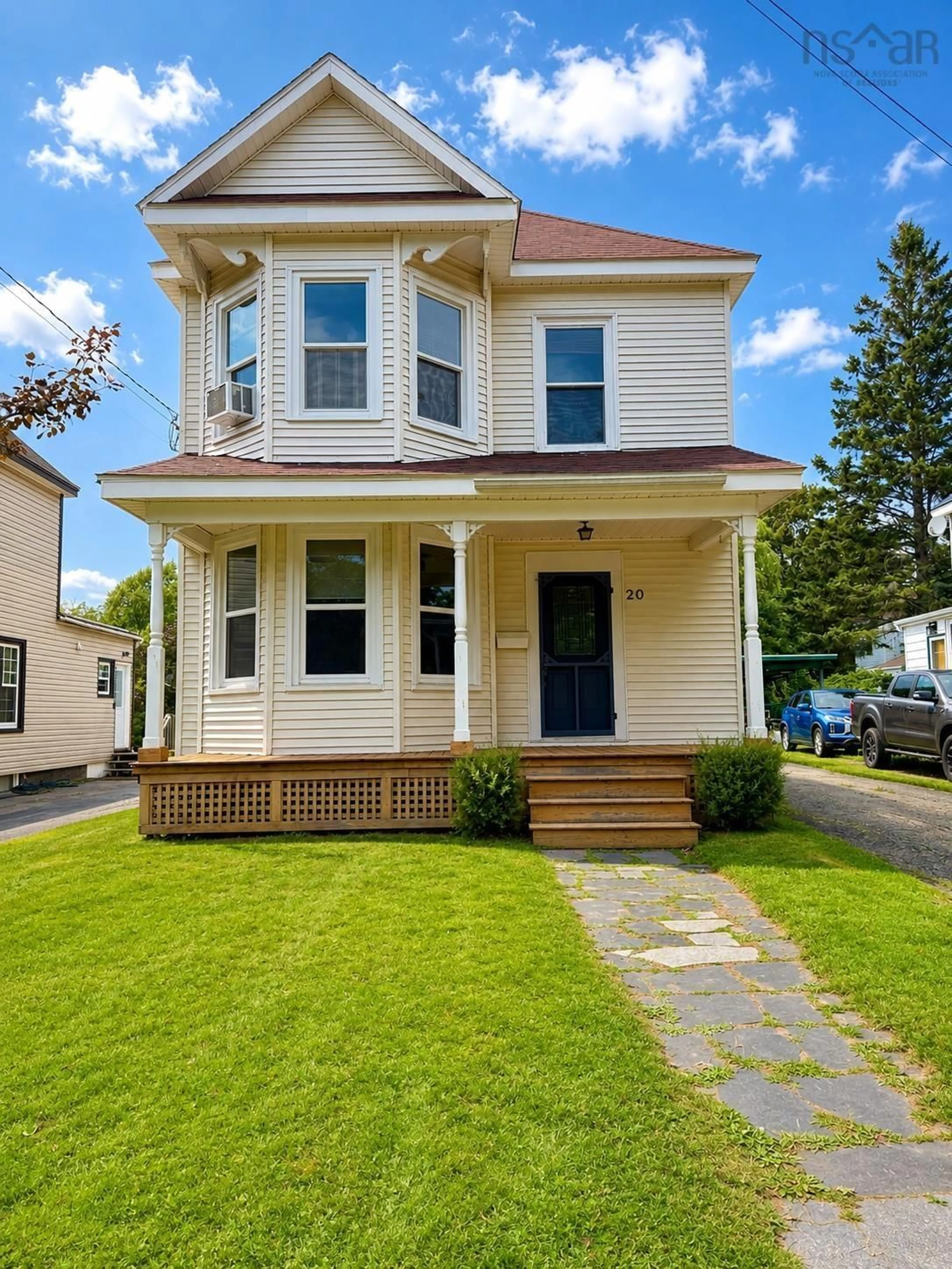 Home with vinyl exterior material, street for 20 Agnew St, Amherst Nova Scotia B4H 2B6