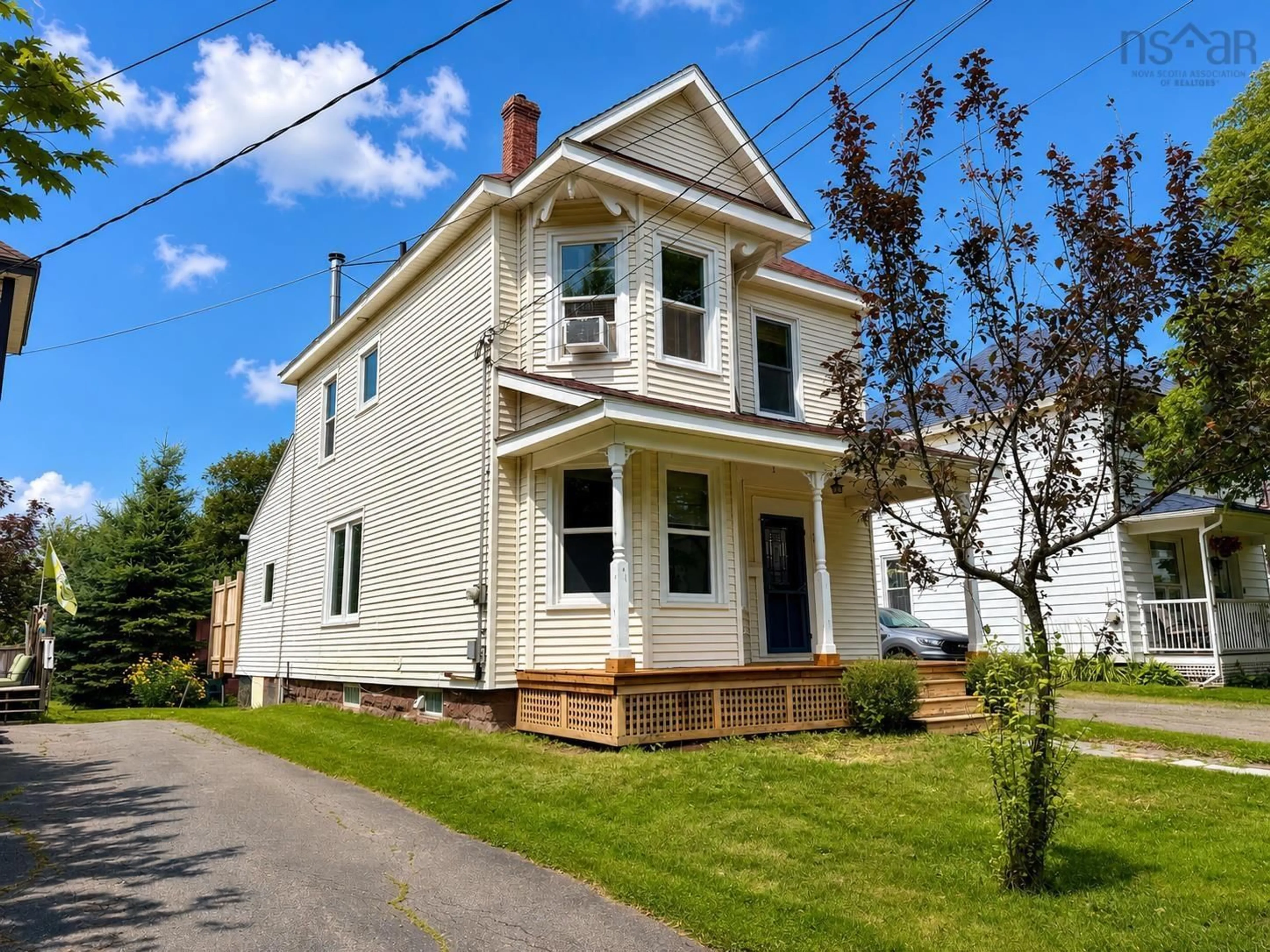 Home with vinyl exterior material, street for 20 Agnew St, Amherst Nova Scotia B4H 2B6