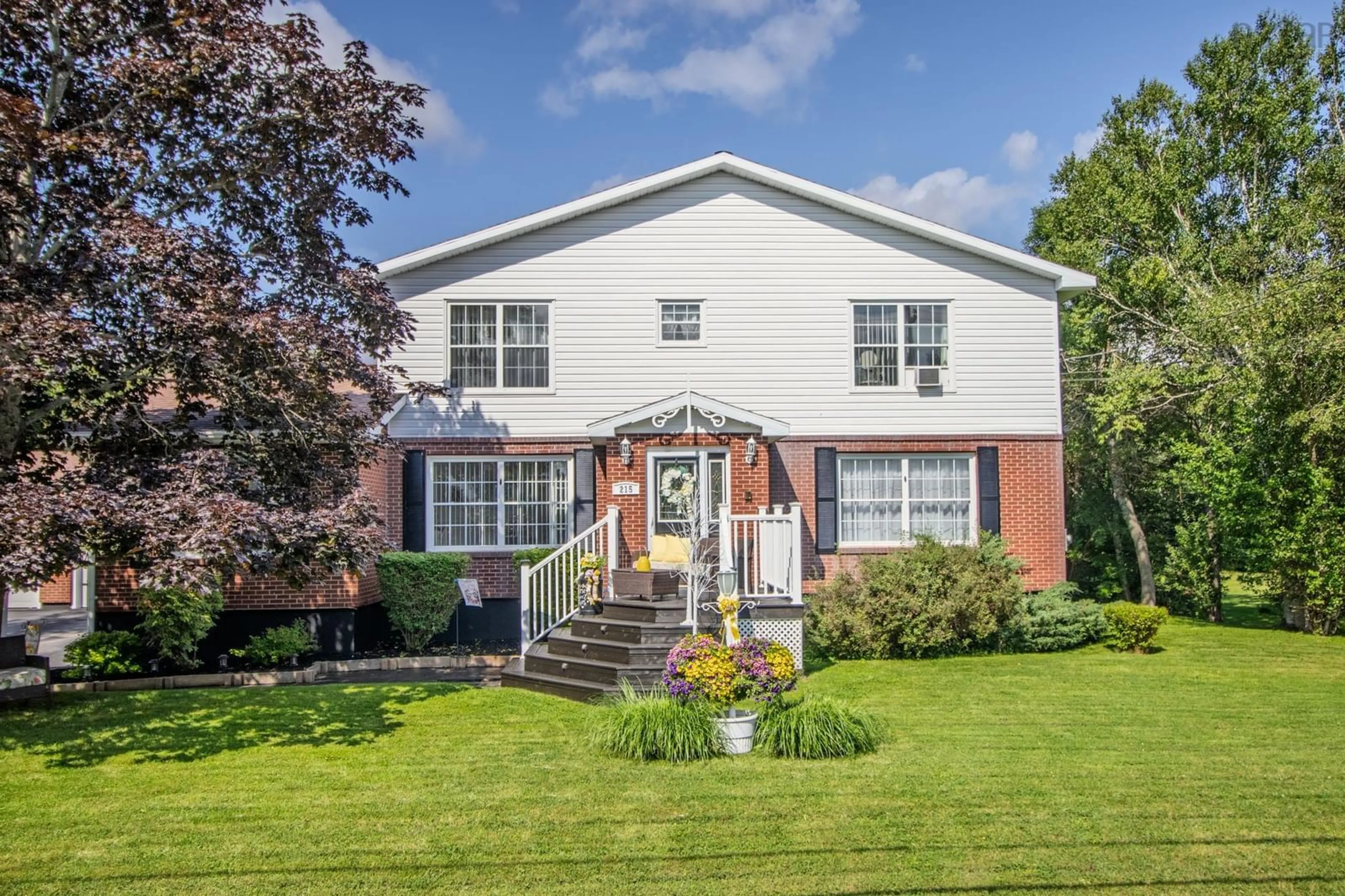 Home with brick exterior material, street for 215 Evergreen Dr, Sydney Nova Scotia B1M 1A6