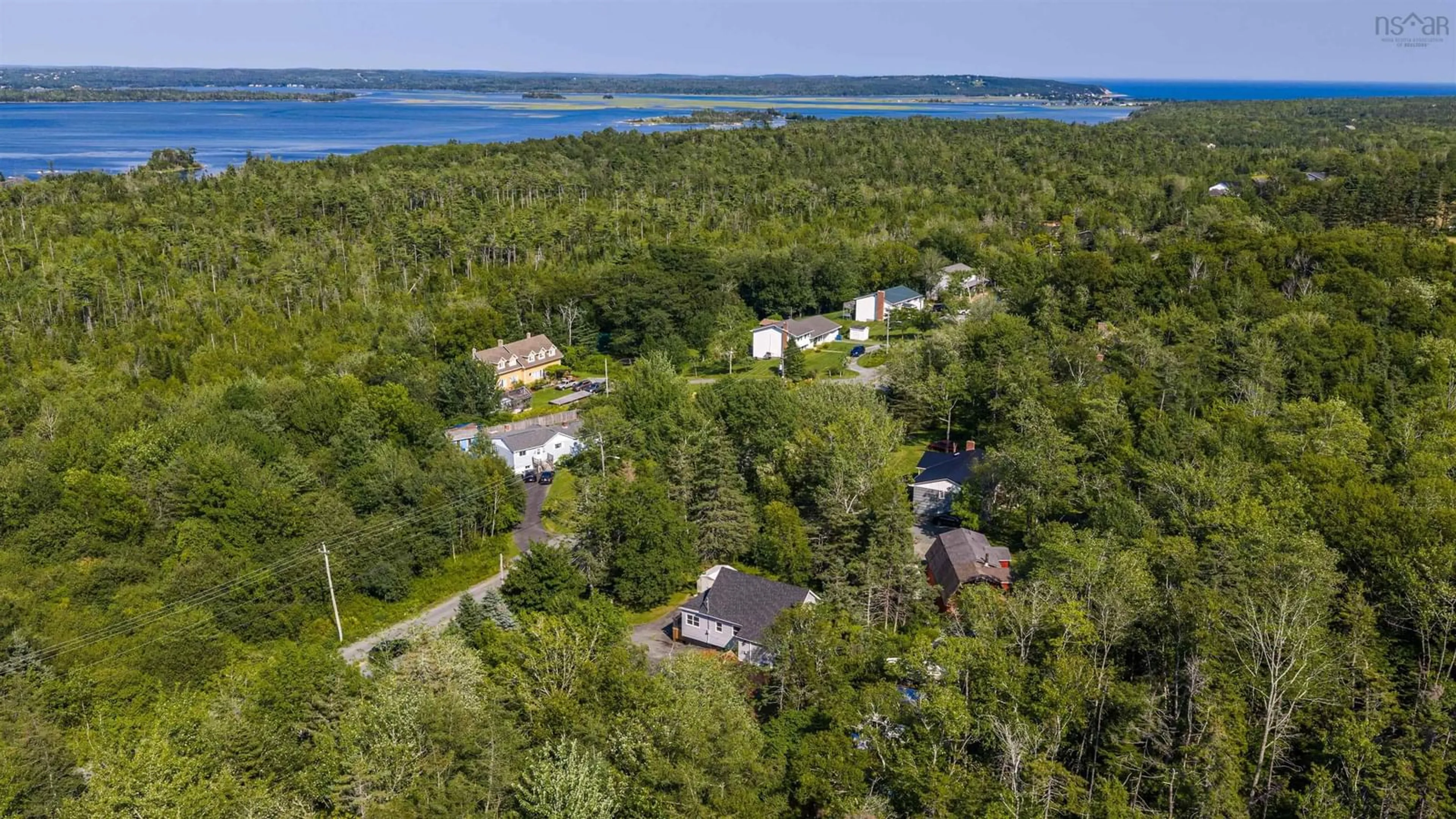 A pic from outside/outdoor area/front of a property/back of a property/a pic from drone, water/lake/river/ocean view for 379 Bissett Rd, Cole Harbour Nova Scotia B2V 2T2