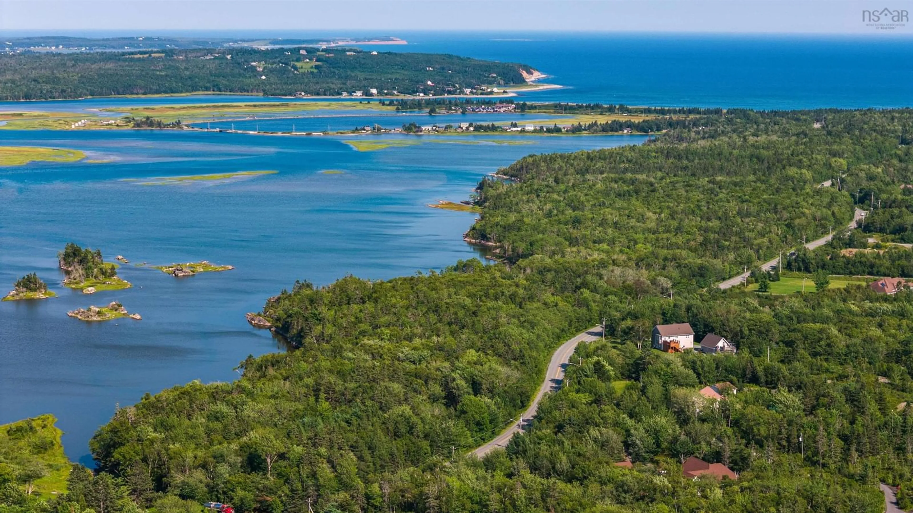 A pic from outside/outdoor area/front of a property/back of a property/a pic from drone, water/lake/river/ocean view for 379 Bissett Rd, Cole Harbour Nova Scotia B2V 2T2