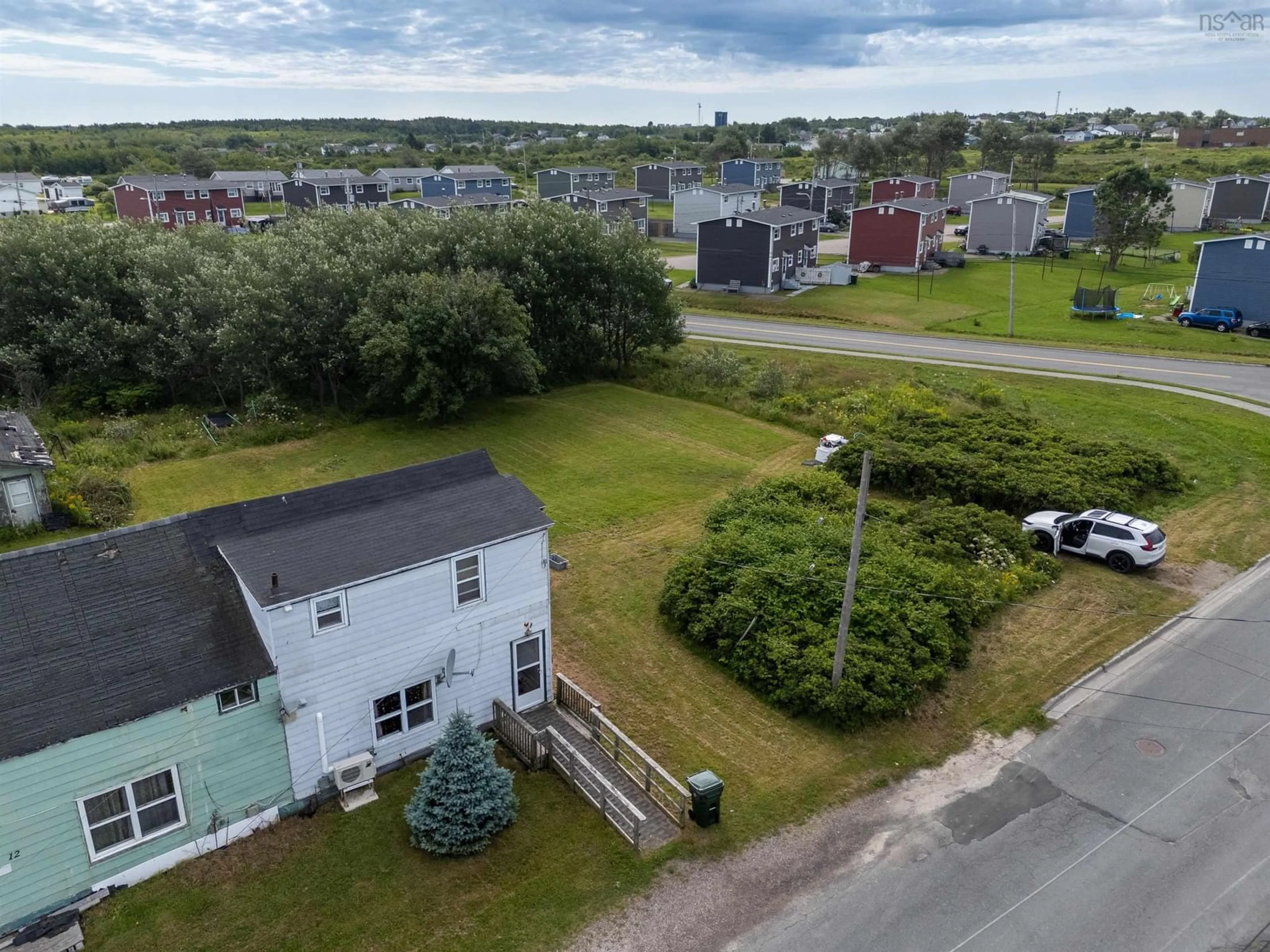 A pic from outside/outdoor area/front of a property/back of a property/a pic from drone, street for 10 Row Street, Glace Bay Nova Scotia B1A 4T7