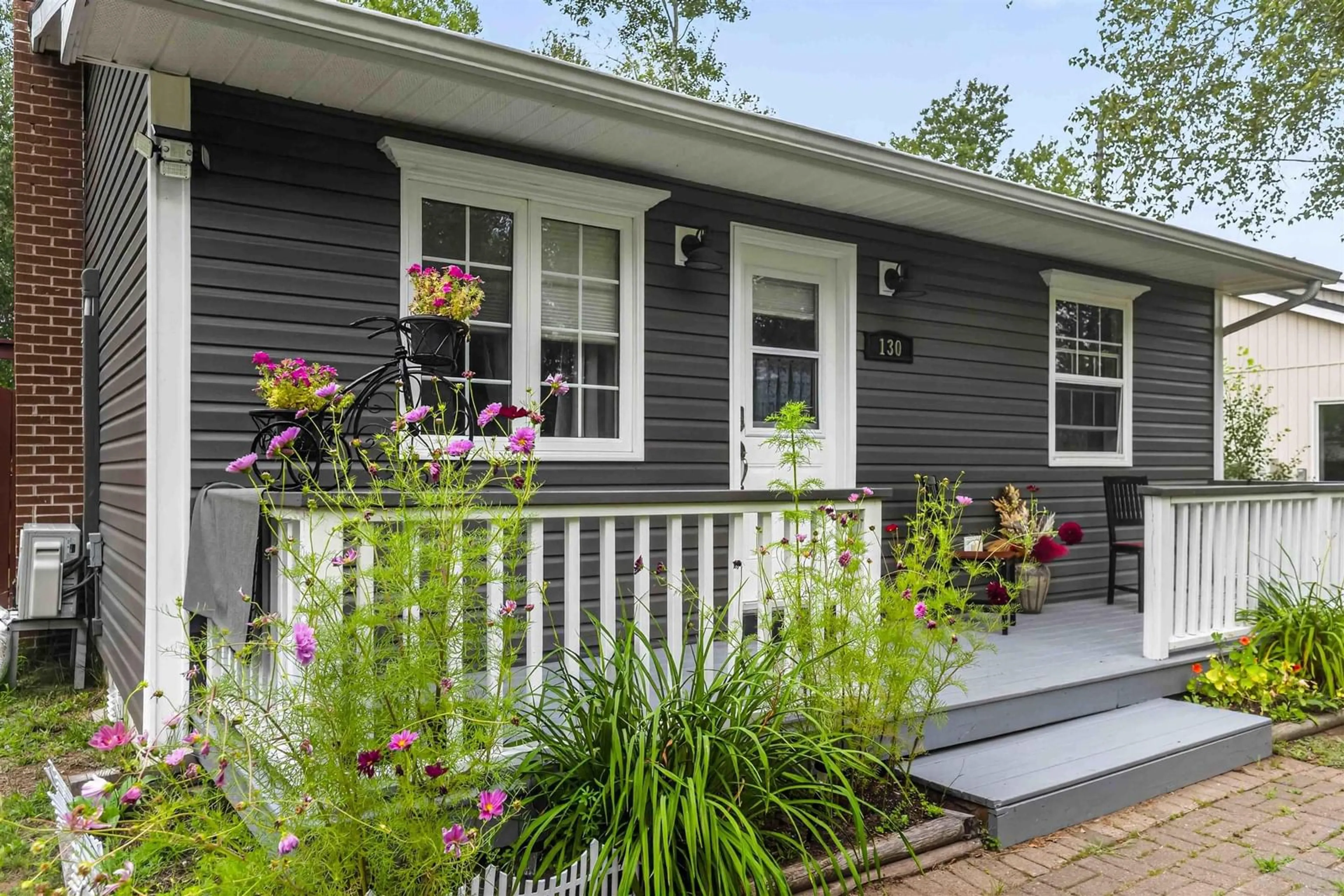 Home with vinyl exterior material, street for 130 Sunset Cres, Middleton Nova Scotia B0S 1P0