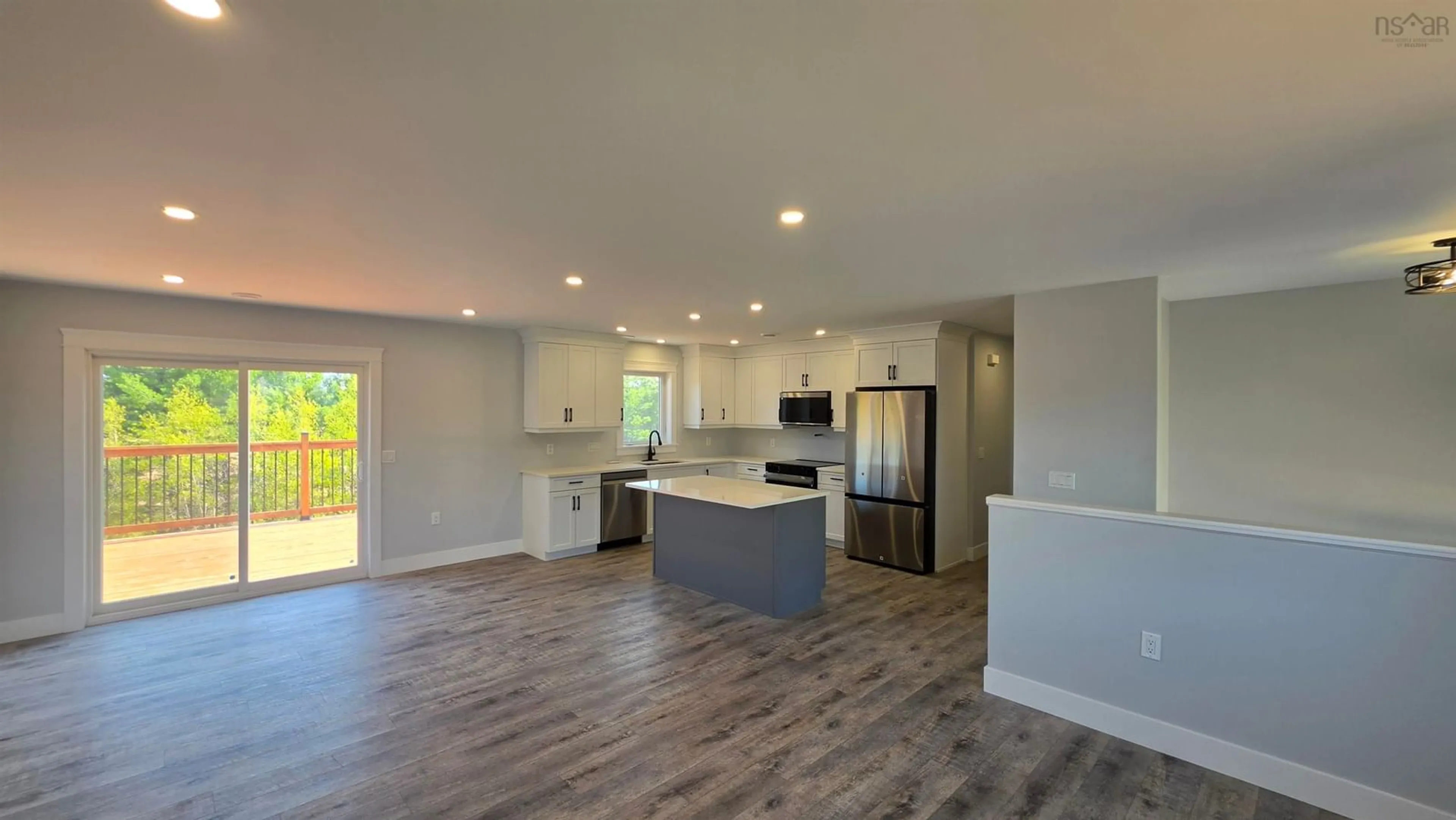Open concept kitchen, wood/laminate floor for 10 Acorn Lane, Kingston Nova Scotia B0P 1R0