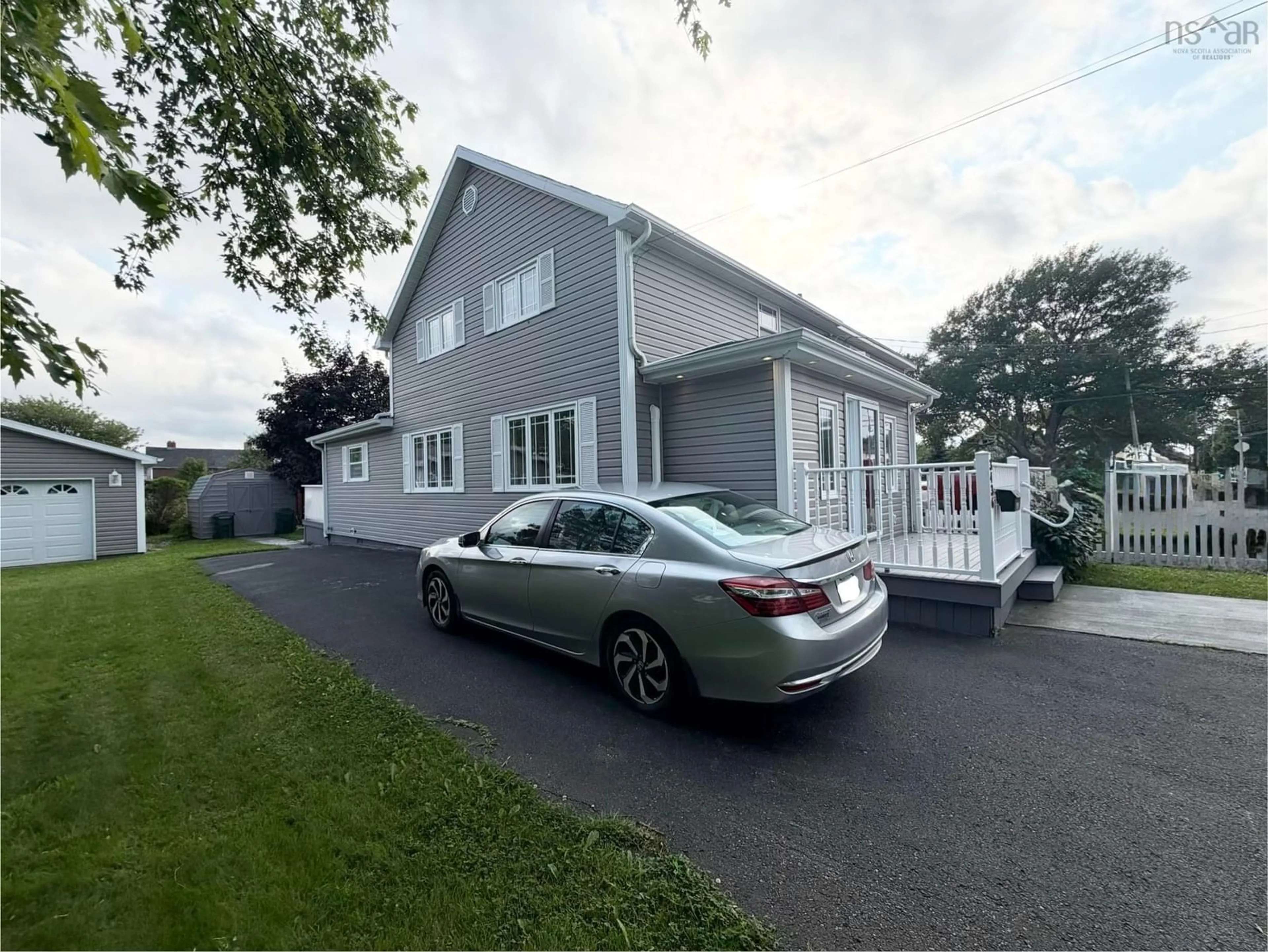 A pic from outside/outdoor area/front of a property/back of a property/a pic from drone, street for 3436 Wood Ave, New Waterford Nova Scotia B1H 1V3