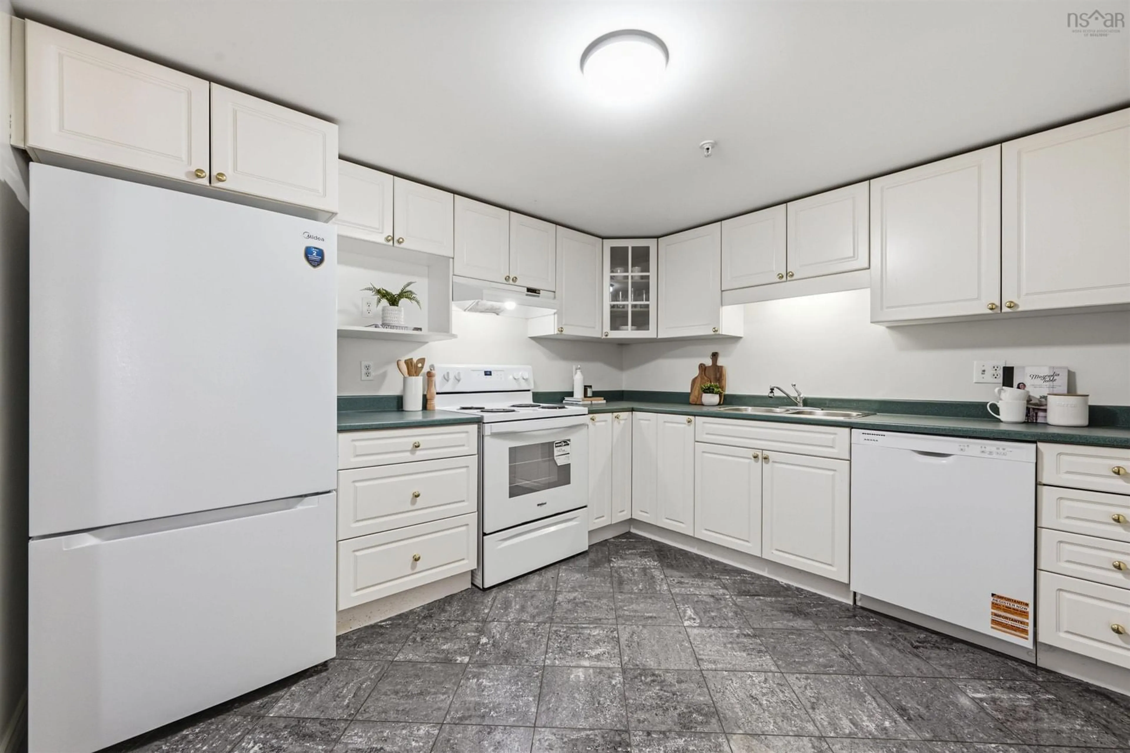 Standard kitchen, ceramic/tile floor for 1041 Wellington St #210, Halifax Nova Scotia B3H 4P5