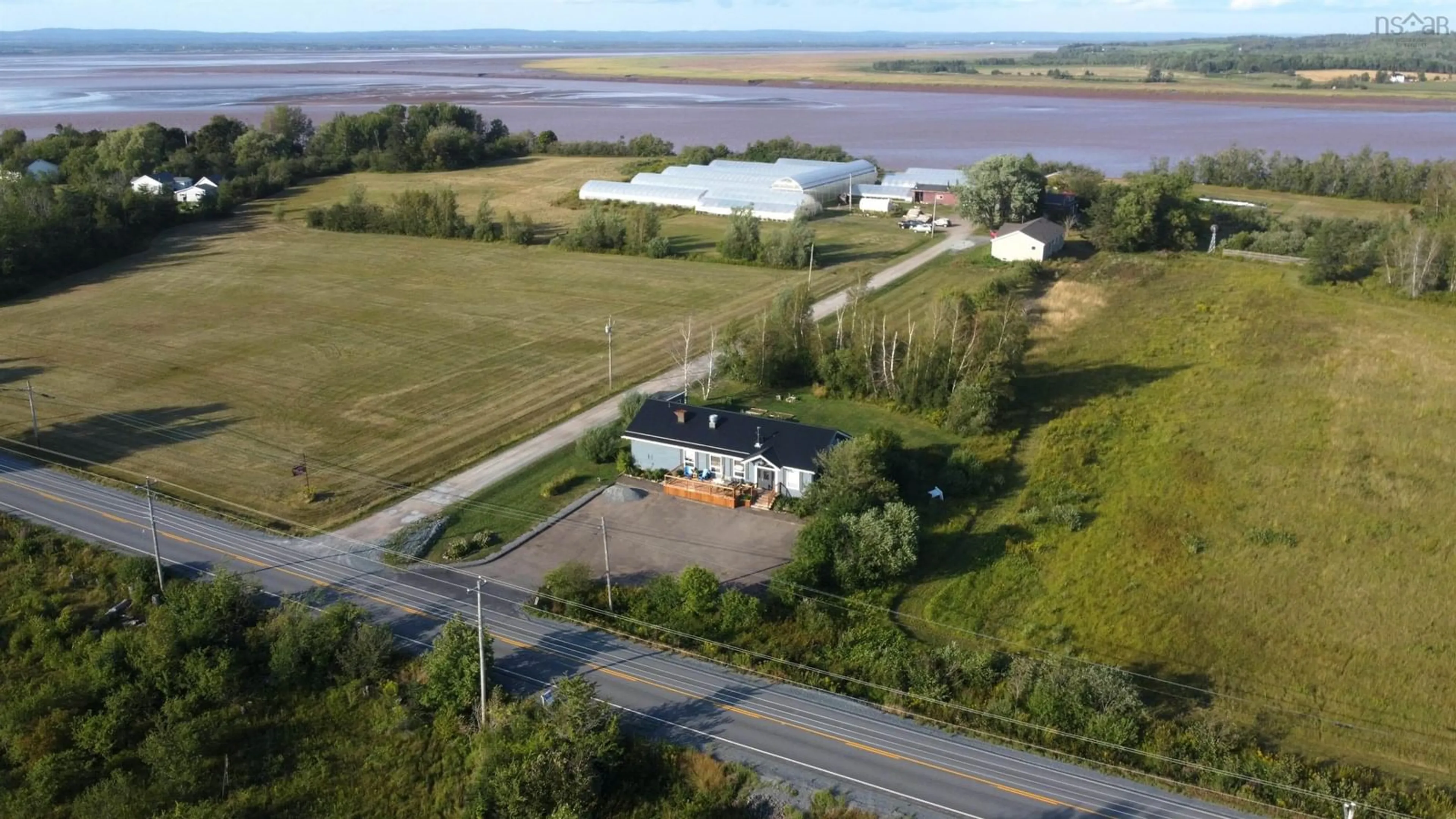A pic from outside/outdoor area/front of a property/back of a property/a pic from drone, water/lake/river/ocean view for 8913 Highway 215 Hwy, Maitland Nova Scotia B0N 1T0