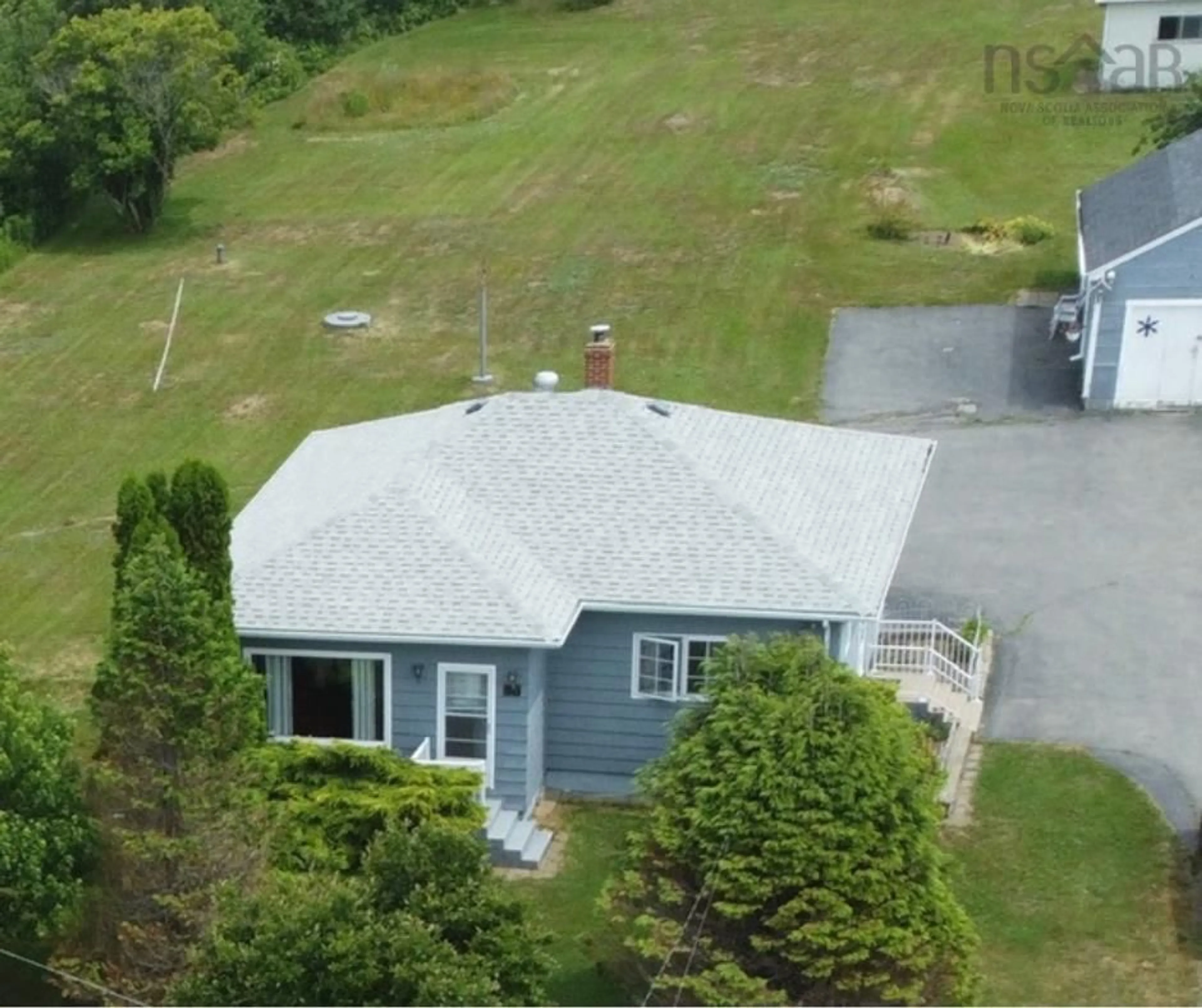 A pic from outside/outdoor area/front of a property/back of a property/a pic from drone, unknown for 40 Denton Rd, Little River Nova Scotia B0V 1A0